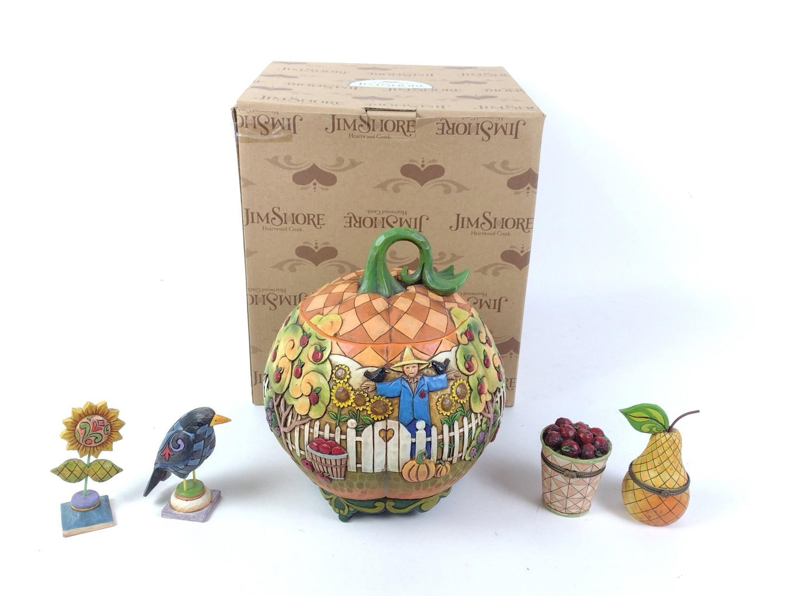 Jim Shore Pumpkin Covered Contain with Mini Figures in OB: All pieces included with original box. 3-1/4" to 9-3/4" high. Pear box disconnected at clasp.