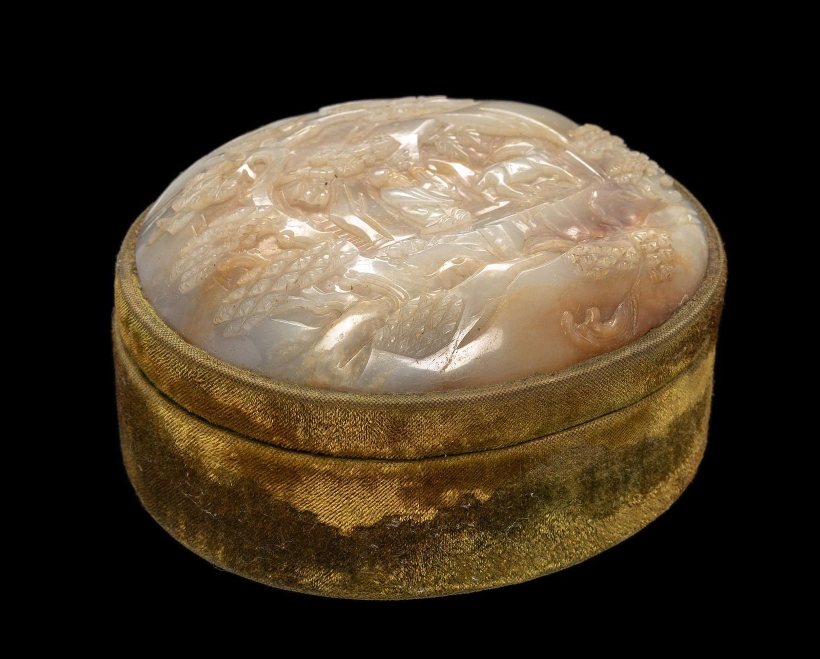 Mutton Jade & Wood Box: DESCRIPTION: Green felt side box with carved mutton jade top. Jade plaque depicts male figure with stag surrounded by trees. MEASUREMENT: 5-3/4" wide x 2-1/4" high. CONDITION: Staining to velvet on si