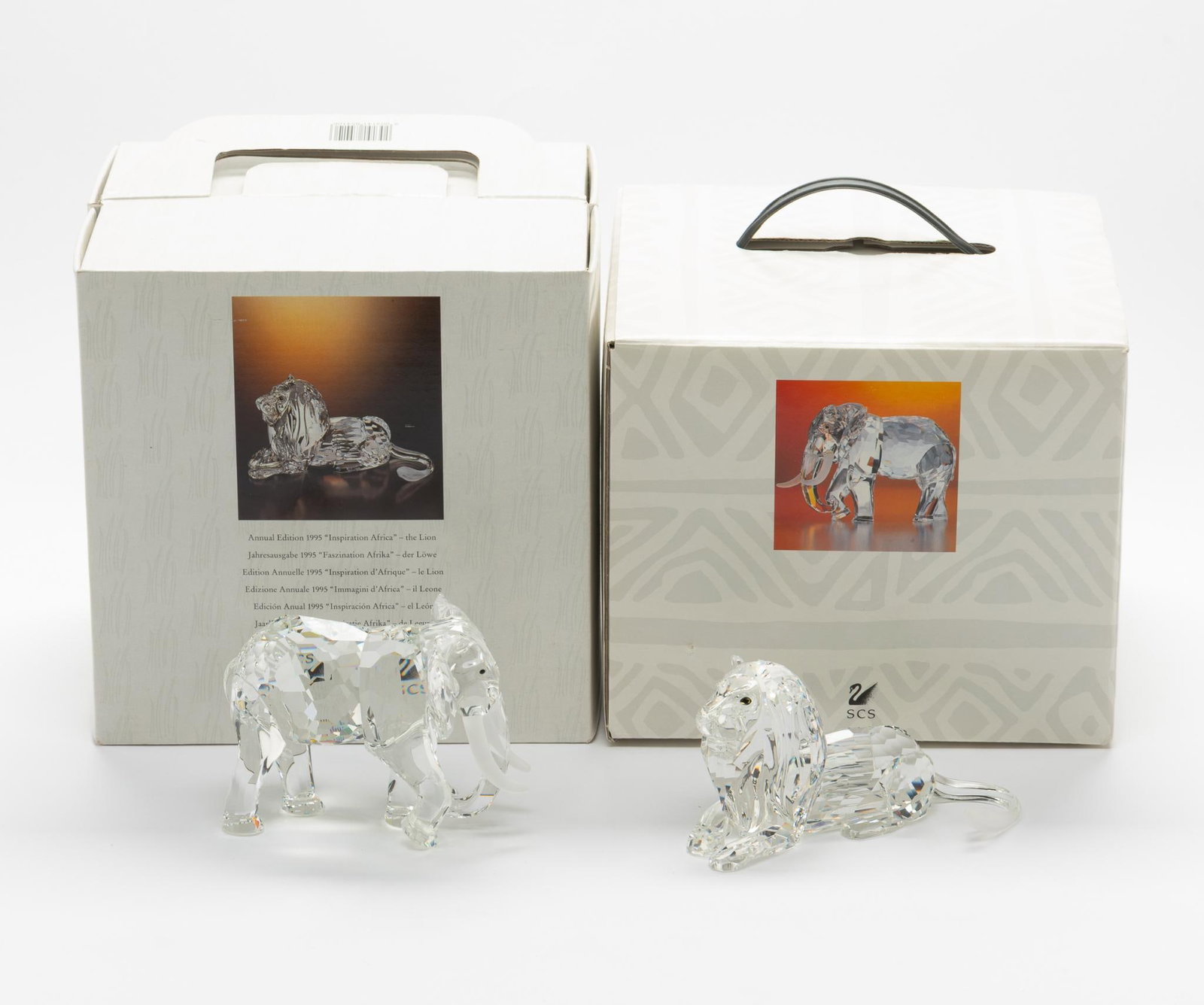 2 Swarovski Inspiration Africa Figurines incl Lion and Elephant w/ OB's: Both with original boxes. 2-1/2" to 3-1/2" high.