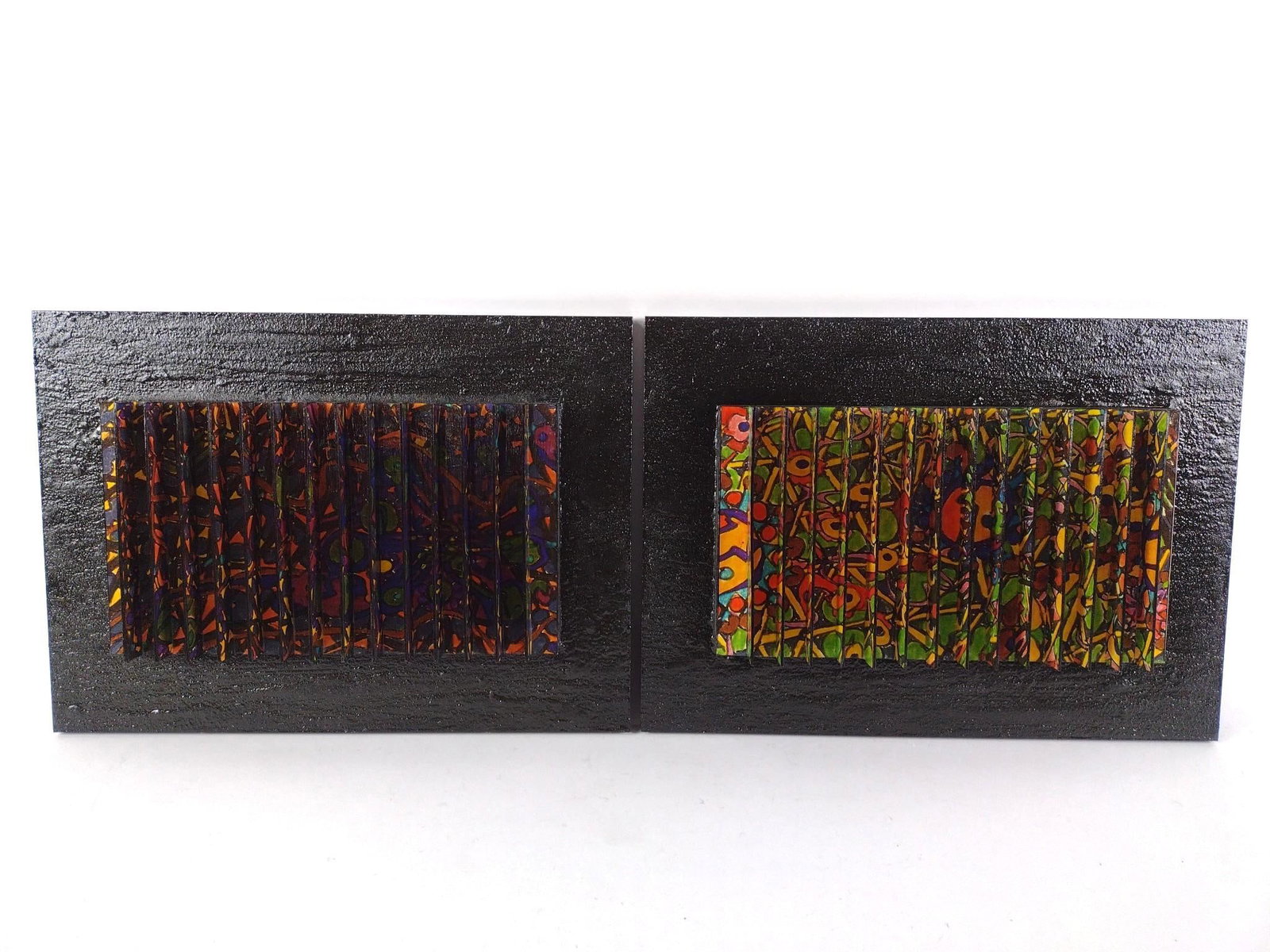 2 Yigal Elyadin 3D Wall Transformation Sculptures: NOT ELIGIBLE FOR IN-HOUSE SHIPPING. Each: 20-1/2" wide x 2-1/2" without case to 3-1/2" with case x 14-3/4" high. PROVENANCE: From the Estate of Yigal Elyadin. Yigal Elyadin was born in 1950 in Tel Avi