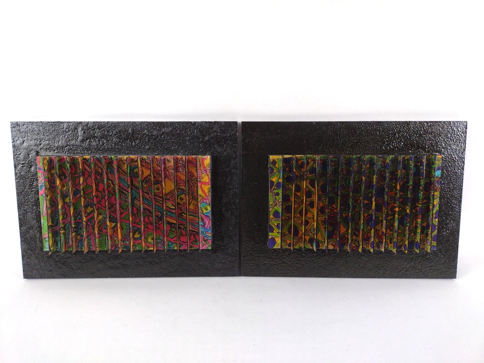 2 Yigal Elyadin 3D Wall Transformation Sculptures: NOT ELIGIBLE FOR IN-HOUSE SHIPPING. Each: 20-1/2" wide x 2-1/2" without case to 3-1/2" with case x 14-3/4" high. PROVENANCE: From the Estate of Yigal Elyadin. Yigal Elyadin was born in 1950 in Tel Avi