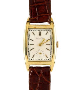14K Gold Zenith Wrist Watch: A 1940's Zenith rectangular watch, 40 mm X 25 mm case size. Weight with strap is 30.6 grams. The watch sets and runs but stops even though wound. Service required.. From an estate collection with hund