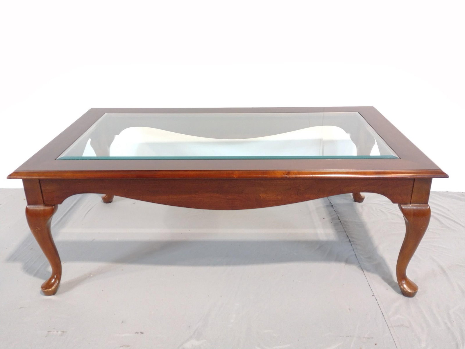 Glass Top Coffee Table: NOT ELIGIBLE FOR IN-HOUSE SHIPPING. 48" wide X 28" deep X 17-1/2" high. Has some light scratches.