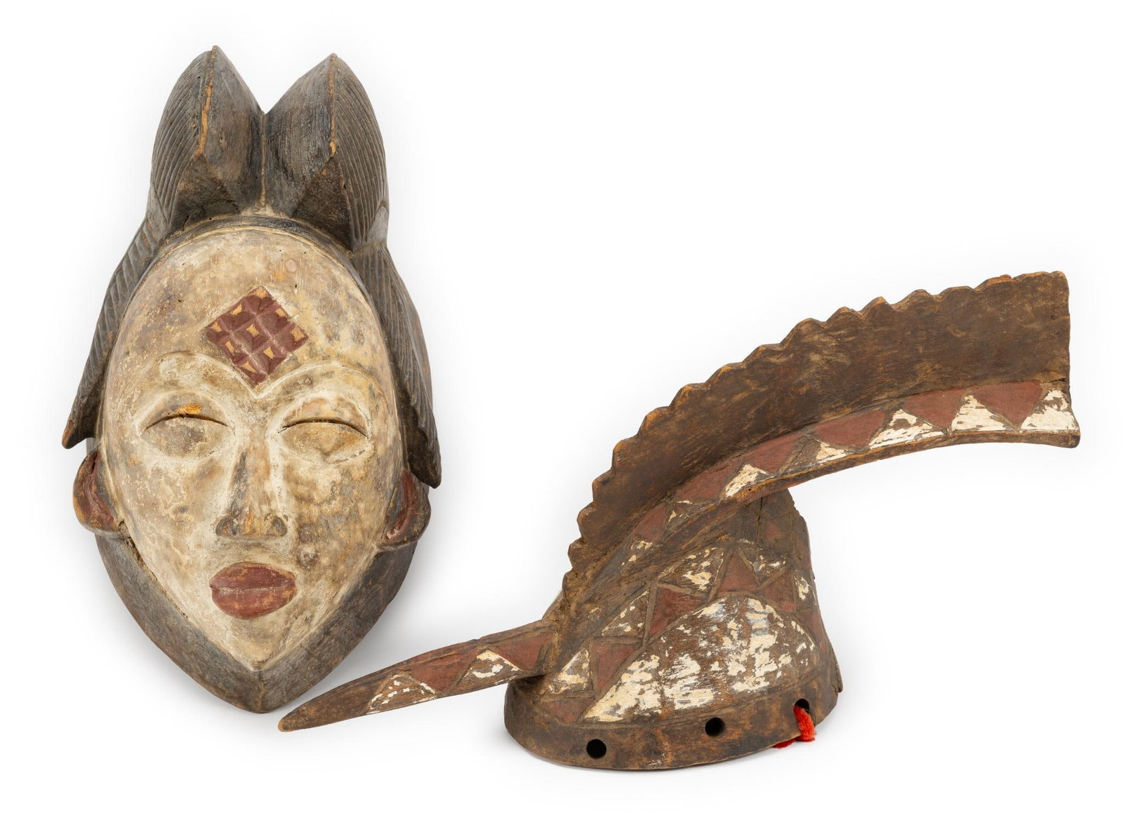 2 Aftican Masks: NOT ELIGIBLE FOR IN-HOUSE SHIPPING. Includes Mossi mask and Gabon mask. The Mossi are a Gur ethnic group native to Burkina Faso, primarily the Volta River basin. Gabon is home to numerous ethnic group
