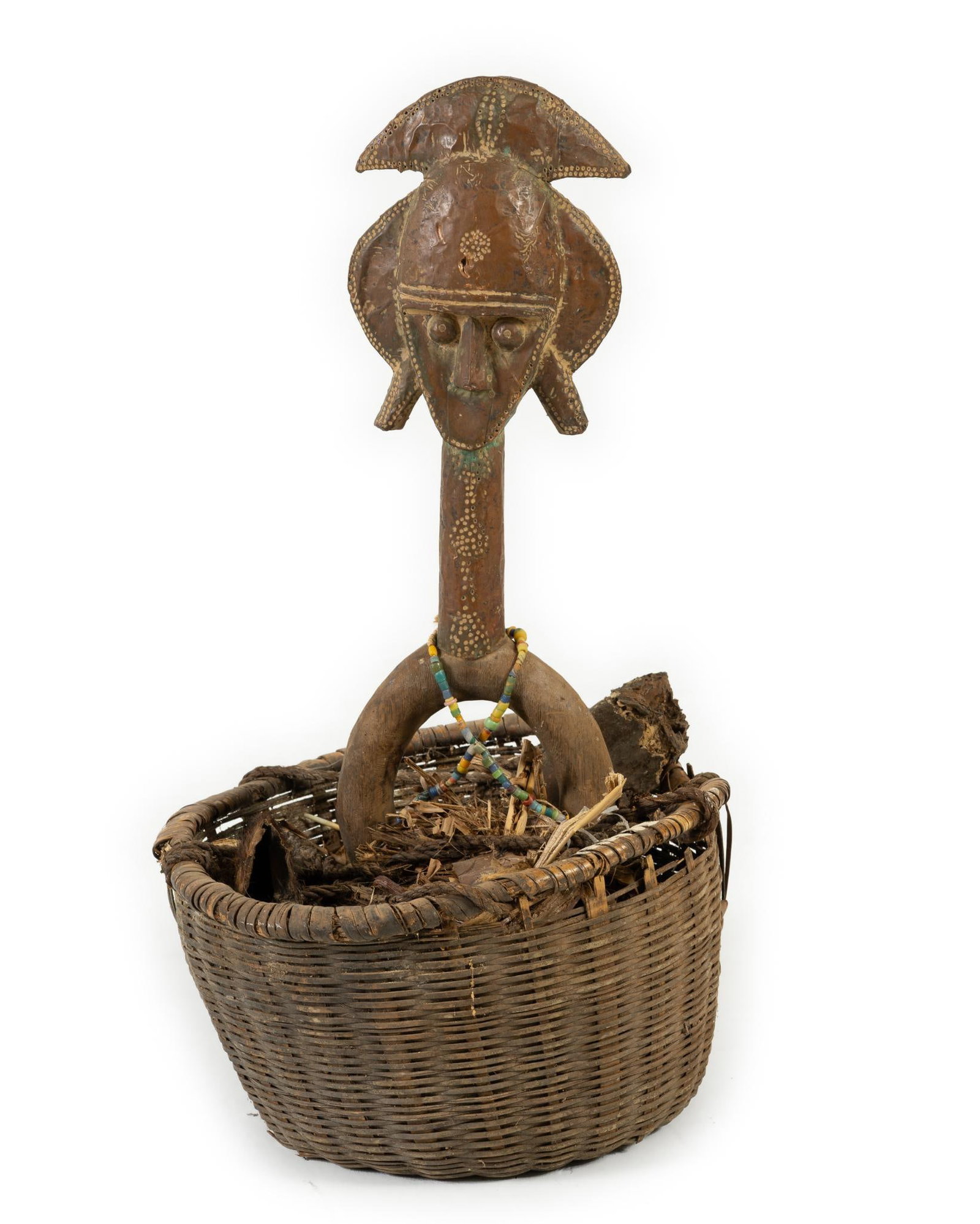 Bakota Reliquary Fetish Statue: NOT ELIGIBLE FOR IN-HOUSE SHIPPING. The Bakota are a Bantu ethnic group from the northeastern region of Gabon and Congo. Measure 15-1/2" wide x 28" high. Wear to the basket.