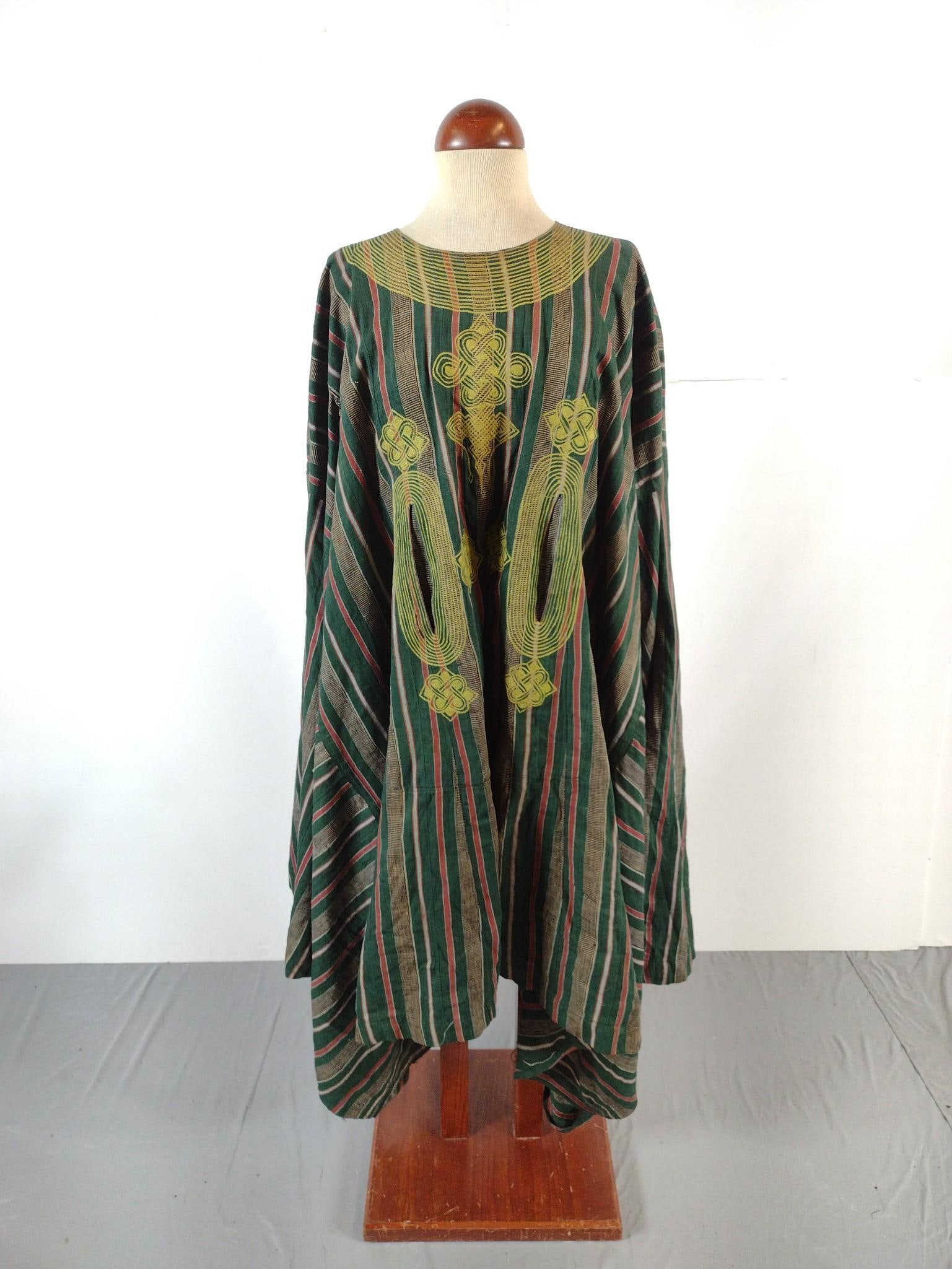 African Dashiki: Measures 83" wide x 37" long. Small hole at front. Some staining.