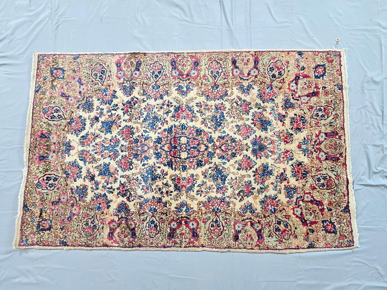 Vintage Persian Kerman Accent Rug: NOT ELIGIBLE FOR IN-HOUSE SHIPPING. 57" x 35". Damage to tassels, but overall good condition.