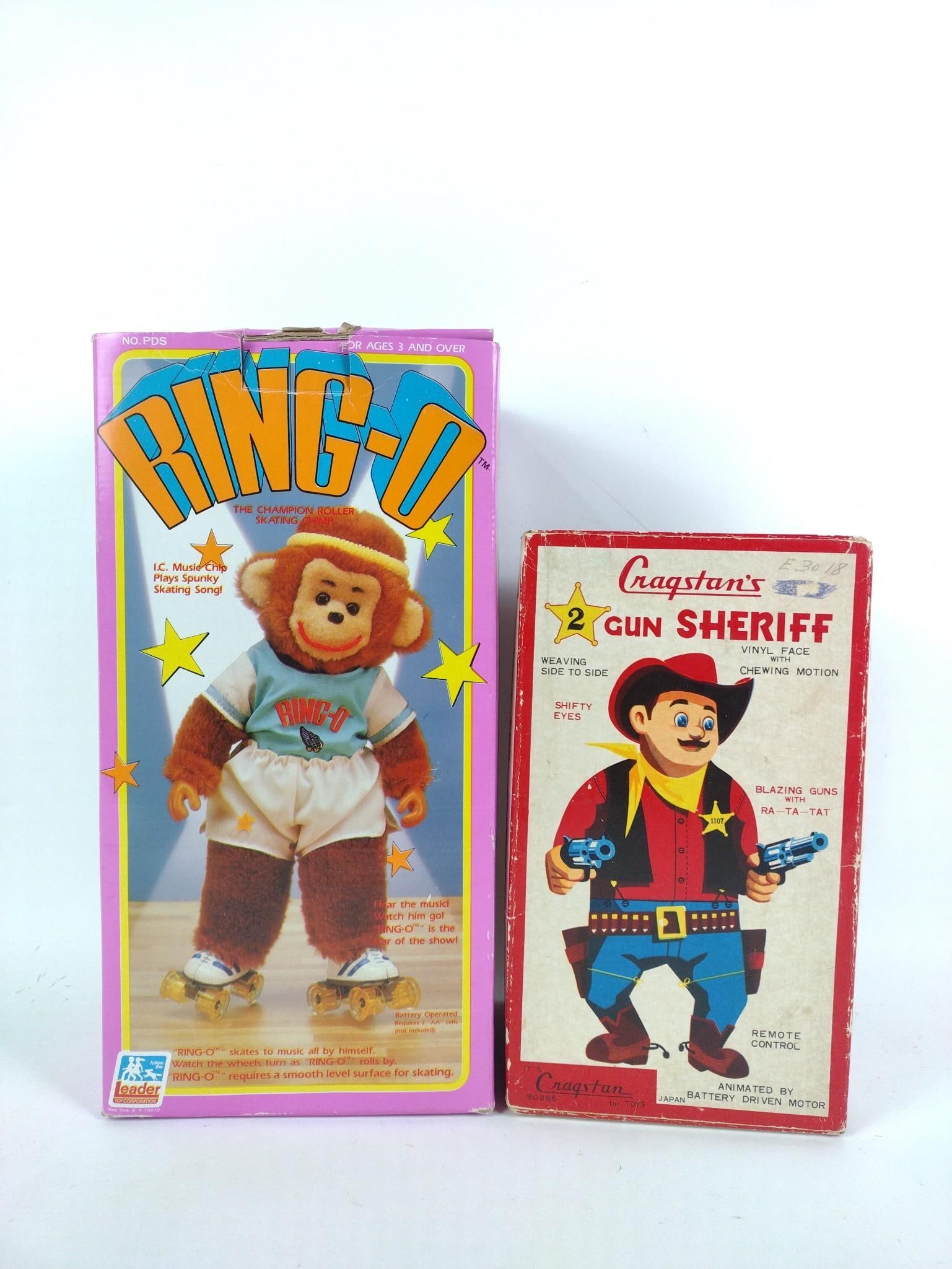 2 Children's Toys in OBs: Includes Cragstan's Gun Sheriff and Ring-O. Both in original boxes. Measures 6-1/2" to 7-1/2" wide x 11" to 14-1/2" long.