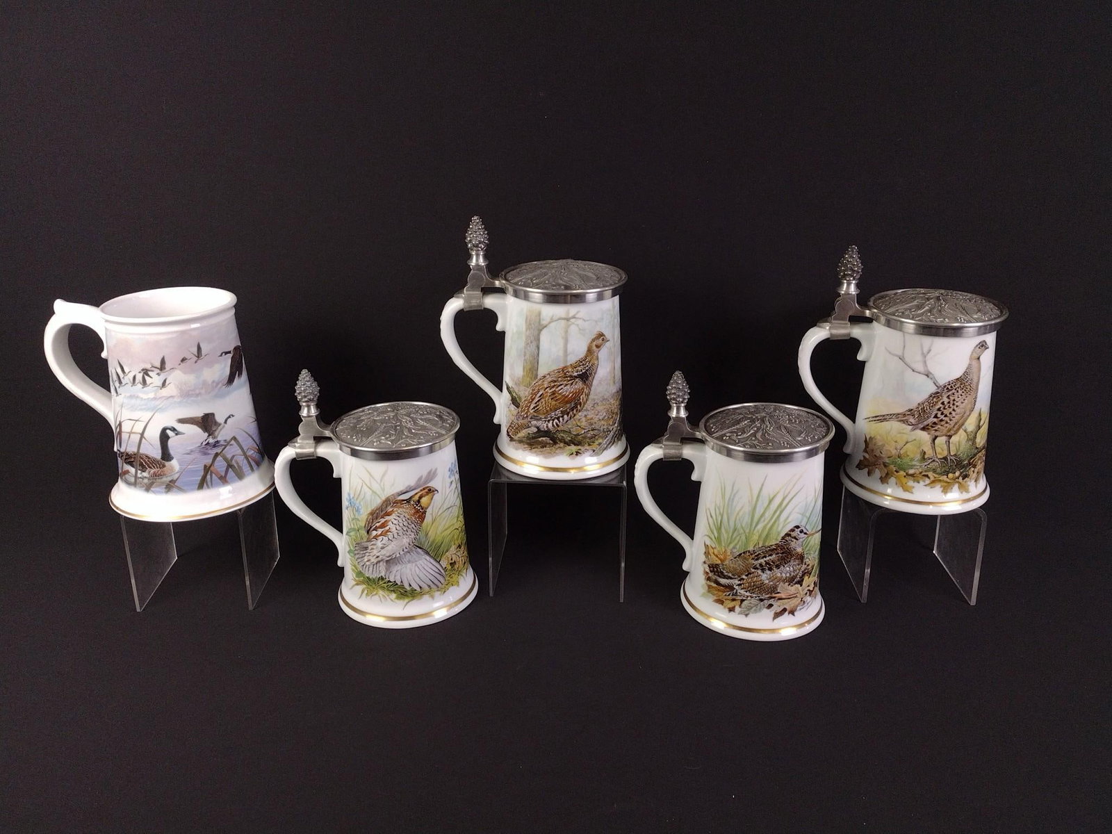 5 Franklin Porcelain Tankards: 7-1/4" to 9" high. One without top.