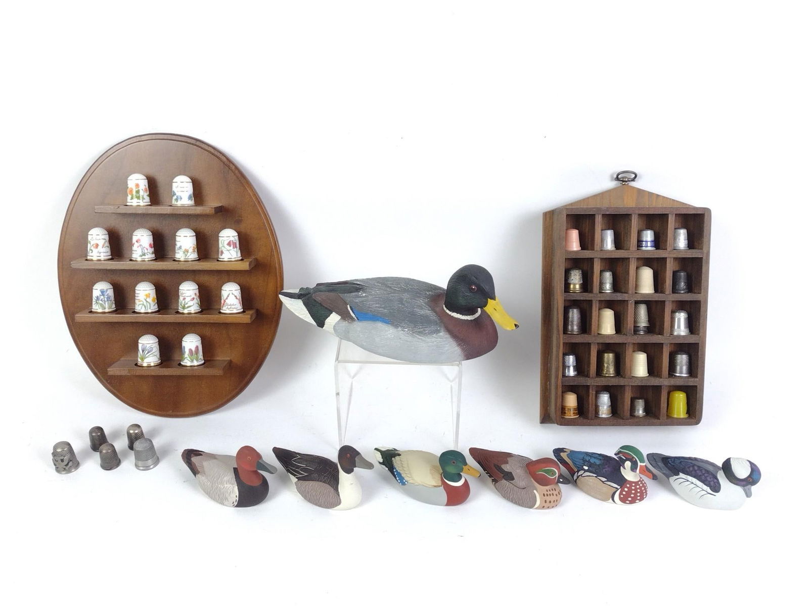 7 Miniature Ducks and Thimble Collection: Ducks include Avon and The Franklin Gallery. 2-1/4" to 3-1/4" high. Thimbles include The Flowers of Holland Thimble Collection with COA.