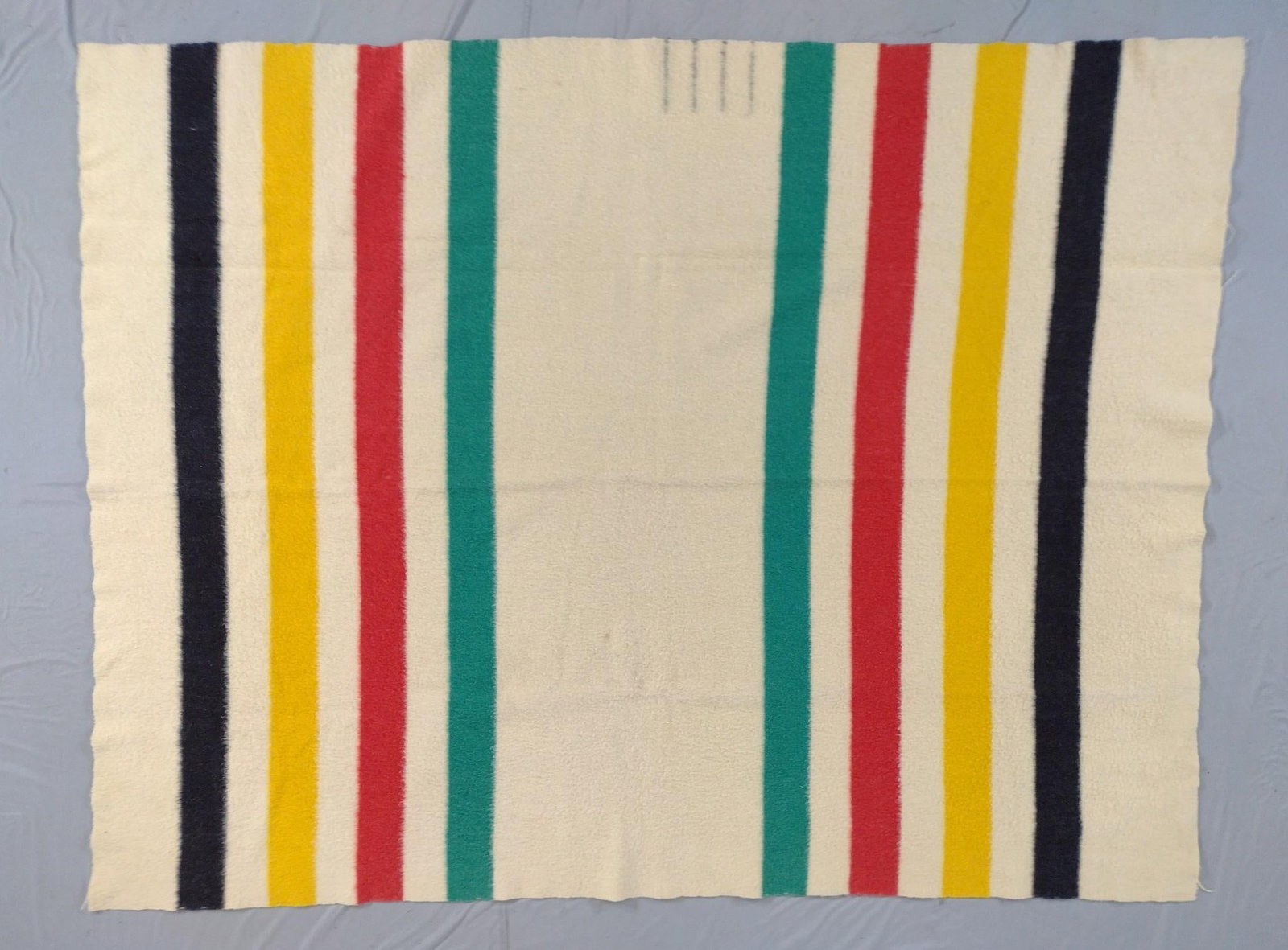 Vintage Hudson Bay Blanket: 68" wide x 89" long. Some discoloration and minor pulls in fabric.