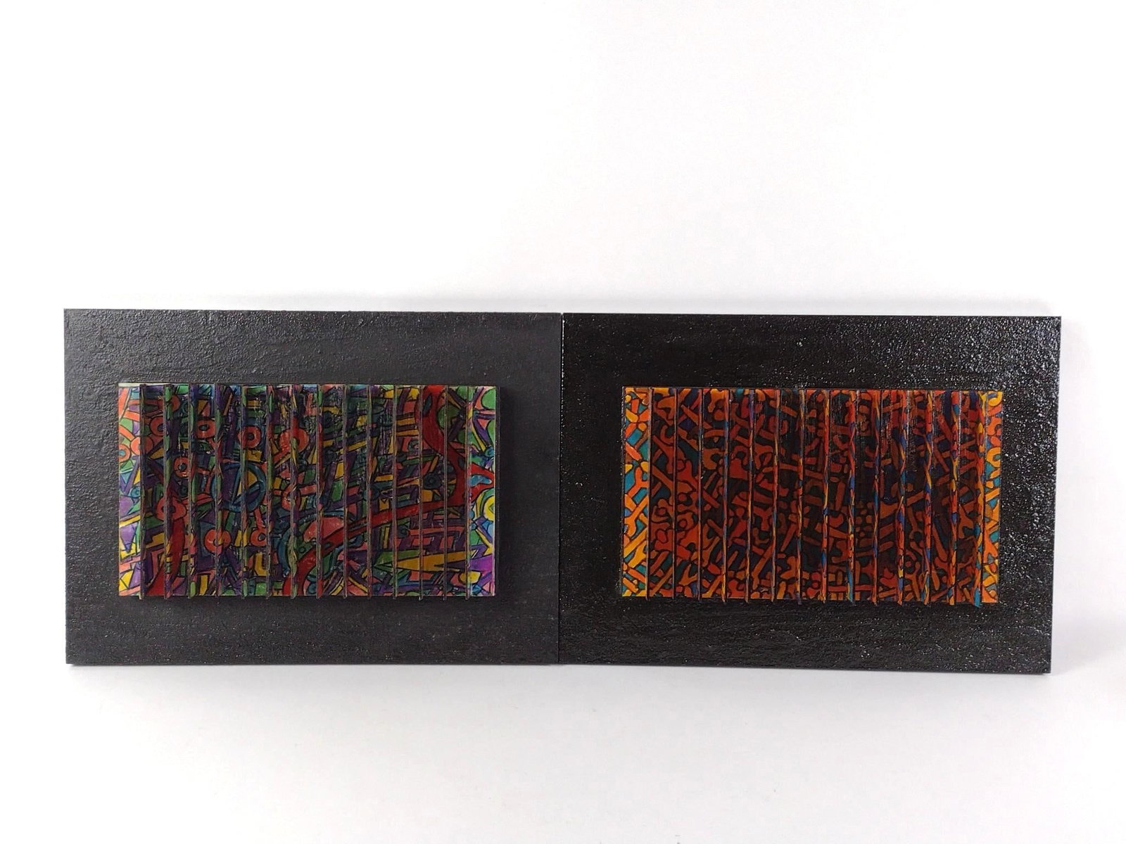 2 Yigal Elyadin 3D Wall Transformation Sculptures: NOT ELIGIBLE FOR IN-HOUSE SHIPPING. Each: 20-1/2" wide x 2-1/2" without case to 3-1/2" with case x 14-3/4" high. PROVENANCE: From the Estate of Yigal Elyadin. Yigal Elyadin was born in 1950 in Tel A