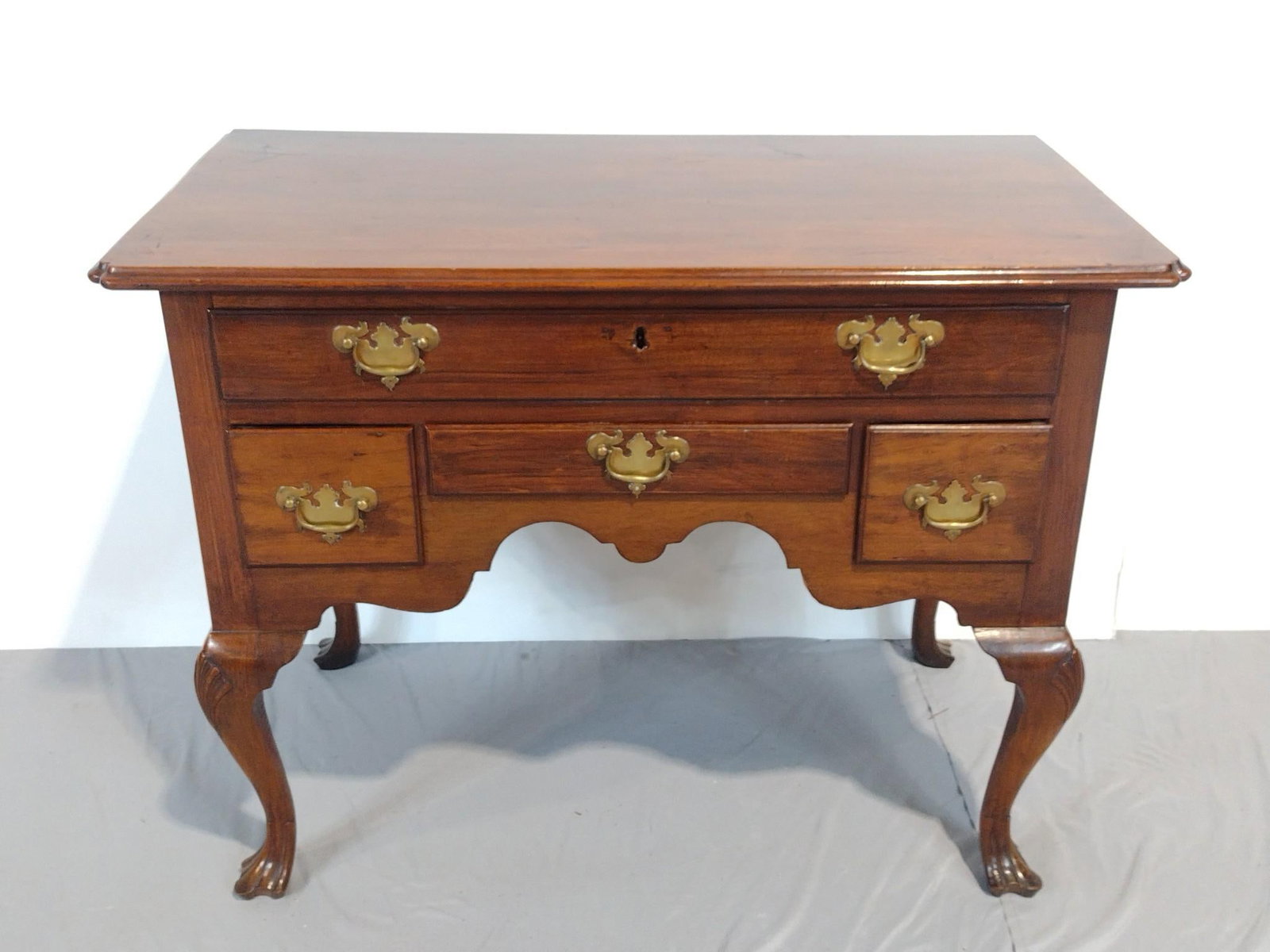 Low Boy: NOT ELIGIBLE FOR IN-HOUSE SHIPPING. 38" wide X 20-1/4" deep X 28-3/4" high. Has some scratches. PROVENANCE: From a Historical Collection.