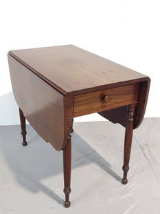Single Drawer Sheraton Drop Leaf Table: NOT ELIGIBLE FOR IN-HOUSE SHIPPING. Refinished. Closed 20-1/4", open 49-1/4" wide X 34" deep X 28-1/2" high. Has some scratches and sun fading. PROVENANCE: From a Historical Collection.