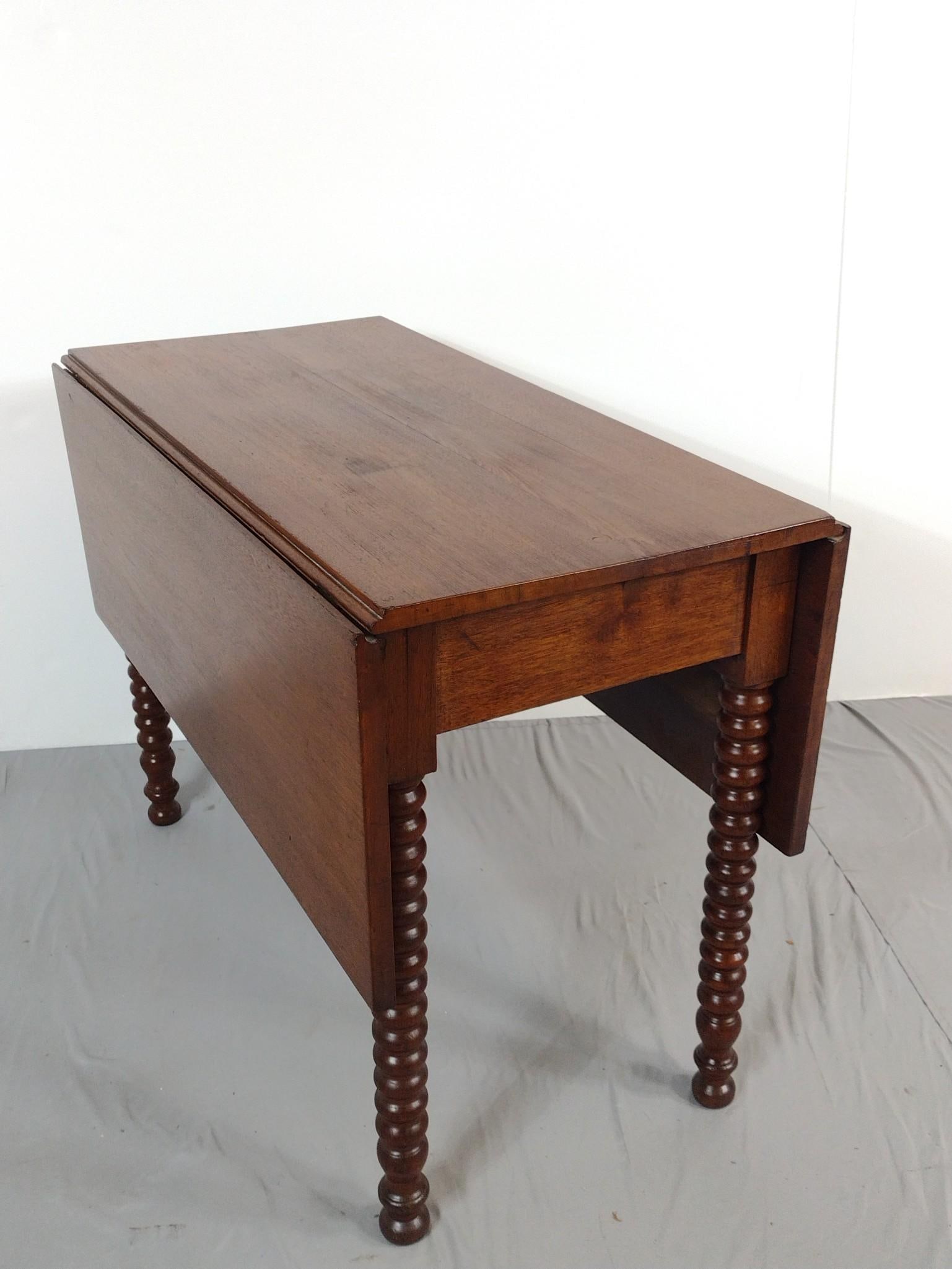 Drop Leaf Table: NOT ELIGIBLE FOR IN-HOUSE SHIPPING. Closed 20", open 46-1/2" wide X 38-1/2" deep X 28-3/4" high. Has a few light scratches.