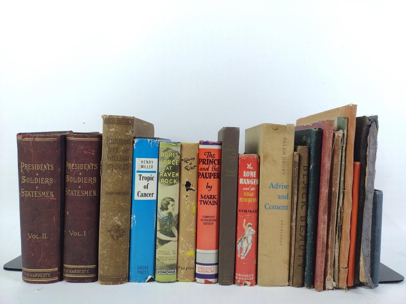 21 Antique Books incl. The Prince & the Pauper: NOT ELIGIBLE FOR IN-HOUSE SHIPPING. Also includes Advise & Consent; Tropic of Cancer; Raising a Riot; Black Beauty; and more. Wear to jackets, covers, and pages consistent with age and use.