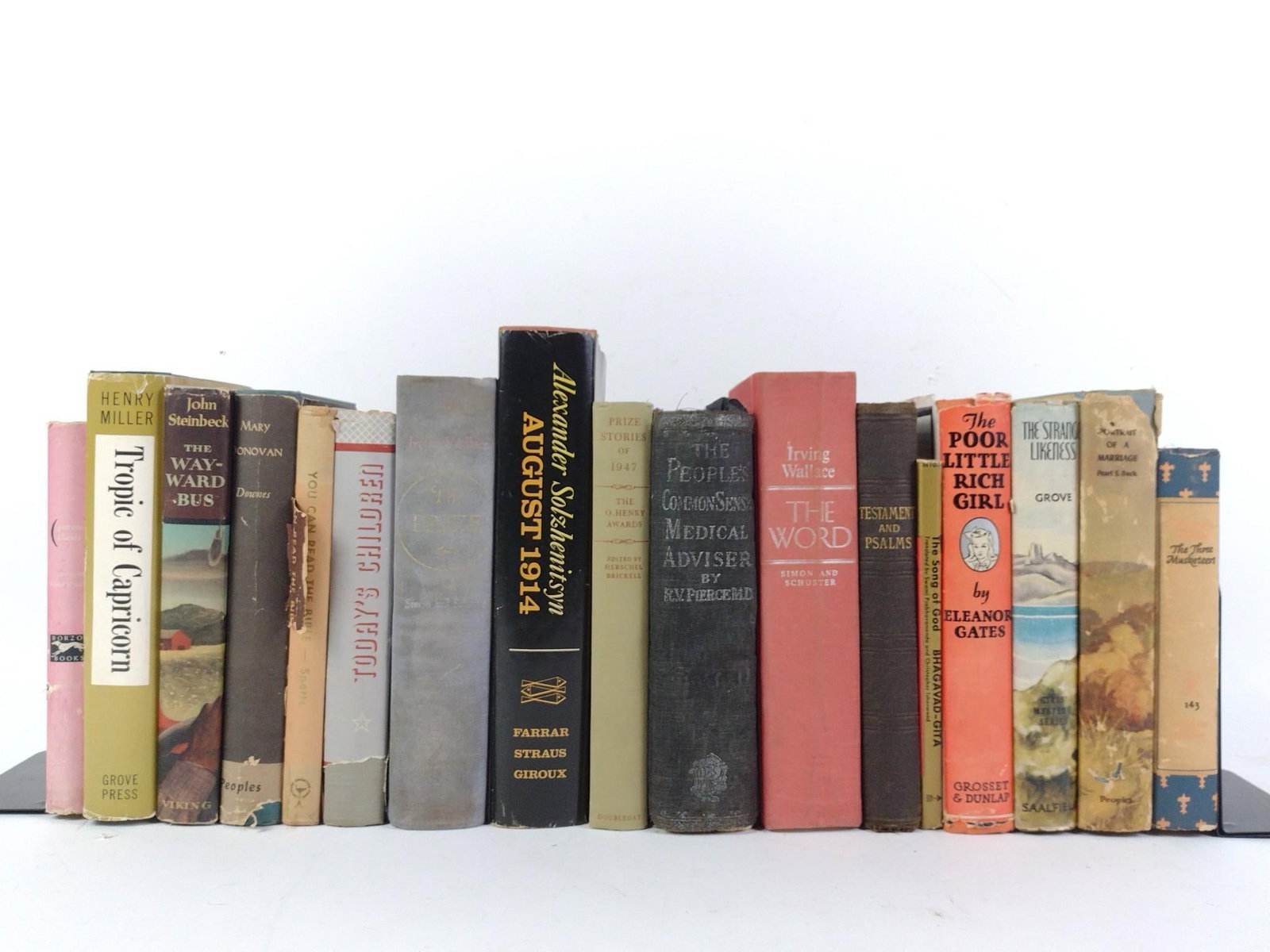 16 Antique Books incl. Tropic of Capricorn: NOT ELIGIBLE FOR IN-HOUSE SHIPPING. Also includes Today's Children; The Wayward Bus; August 1914; The Three Musketeers; and more. Wear to covers, dust jackets, and pages consistent with age and use.