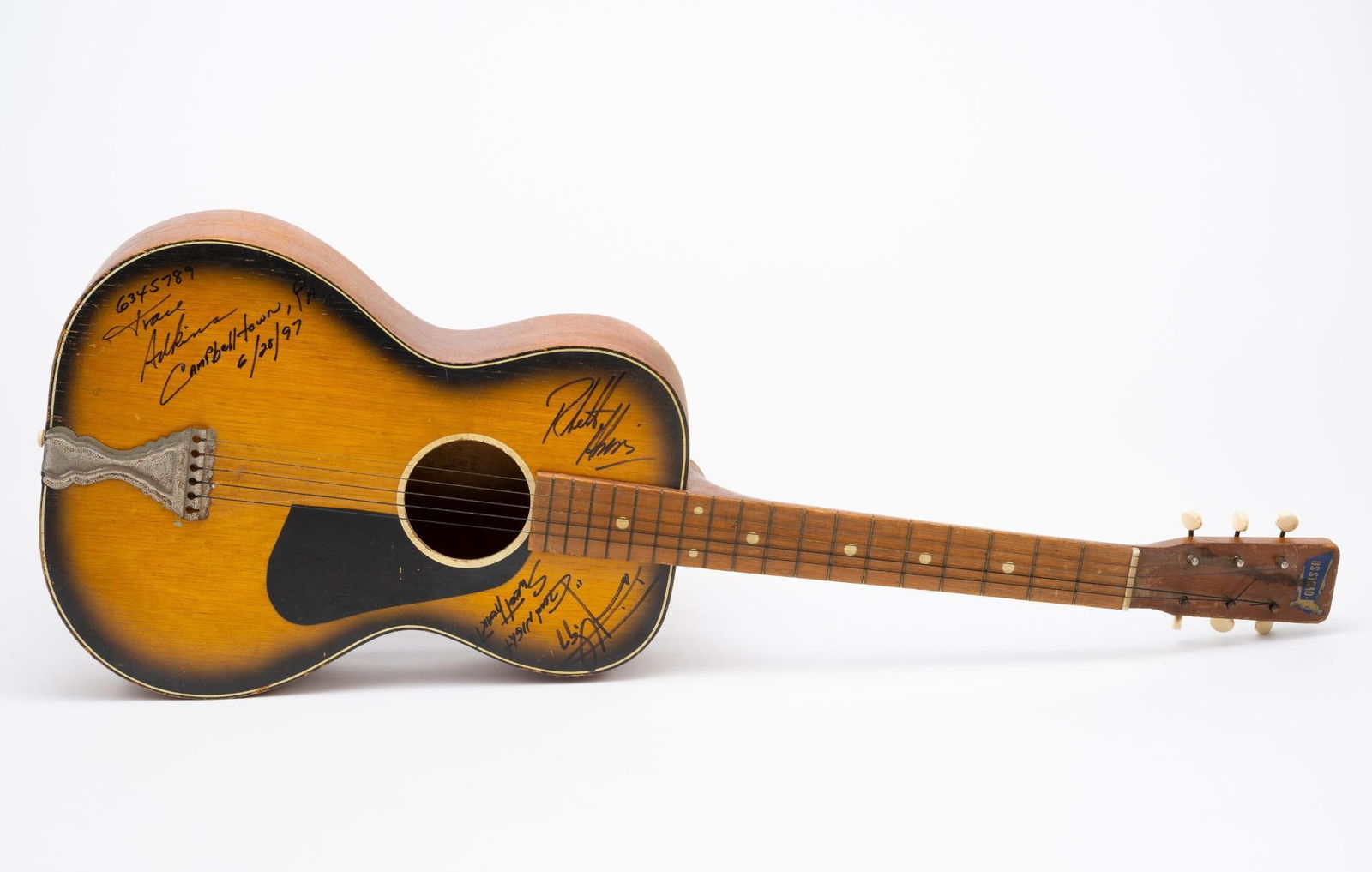 Country Music Autographed Acoustic Guitar: NOT ELIGIBLE FOR IN-HOUSE SHIPPING. Includes "Good Night Sweet Heart '97" with indecipherable signature, Trace Atkins 6345789 Campbelltown, PA 6/28/97, Rhett Atkins, Chase Williams and indecipherable