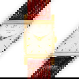 14K Gold Longines Antique Rectangular Wrist Watch: A gold Longines from 1953 with a fine and original guilloche dial. The band is tourneau genuine crocodile Italy. The watch sets, runs, and keeps time but has not been checked for accuracy. From an est