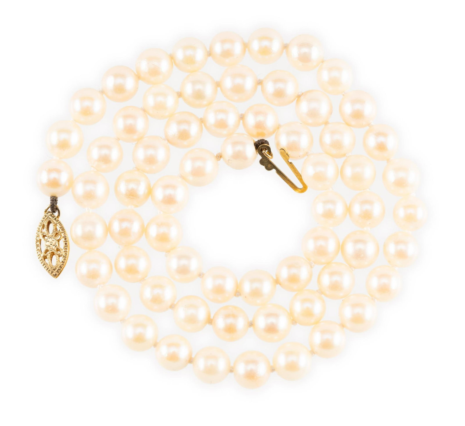Pearl Necklace With 14K Gold Clasp: Cultured pearls 6 to 6.5 mm diameter on a 16 1/2" necklace. The clasp is 14k yellow gold.