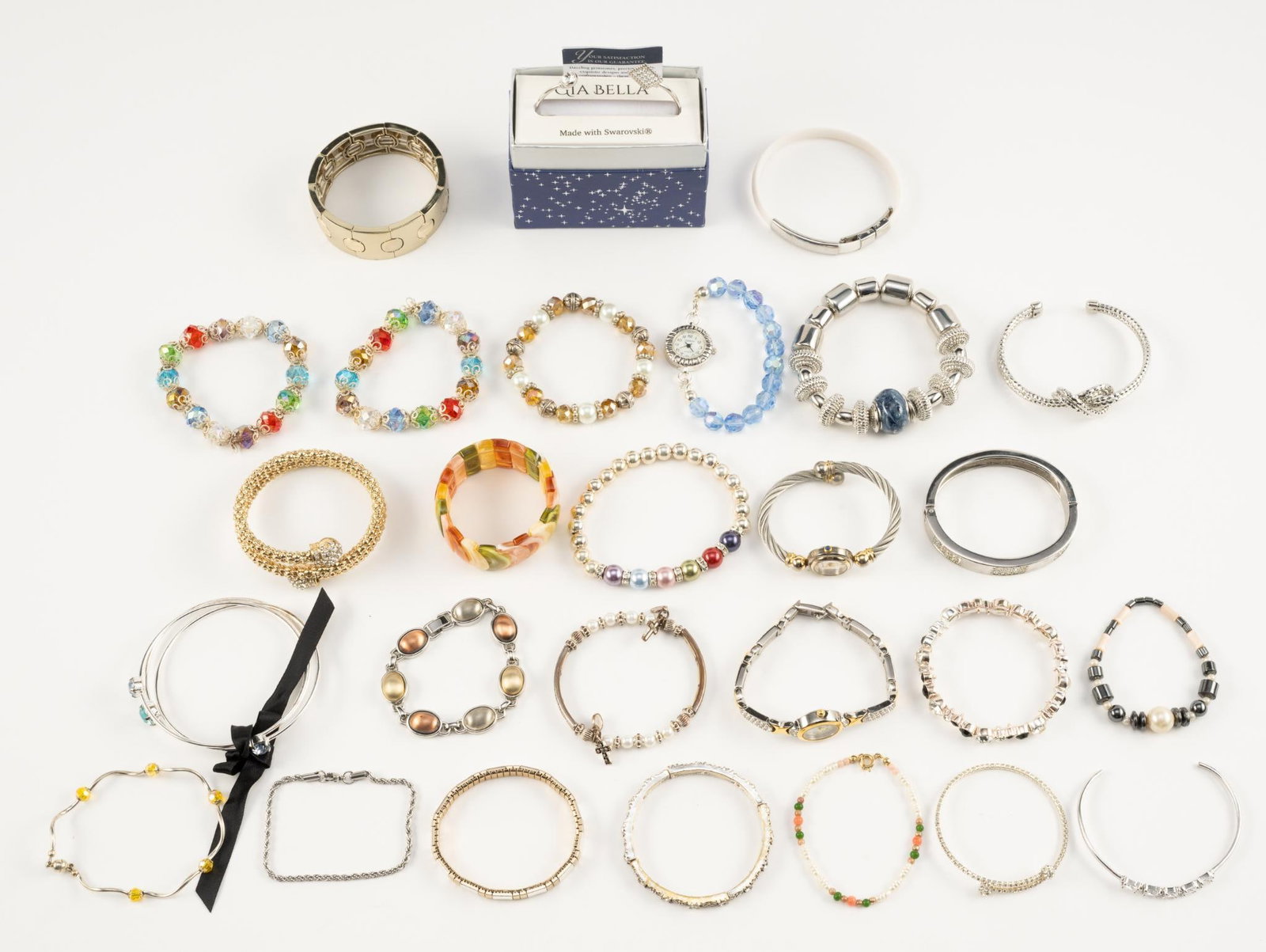 29 Costume Bracelets: Measure 2-1/8" to 2-1/2" inside diameter.