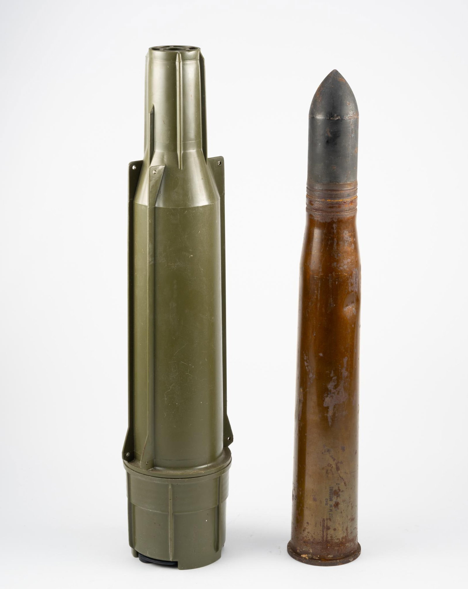 57mm Complete Drill Round & Rocket Cannister: NOT ELIGIBLE FOR IN-HOUSE SHIPPING. Rocket canister for Gustav 84mm rocket & 57mm complete drill round M22. 3-1/2" to 4-1/2" wide x 22-1/2" to 23-3/4" high.