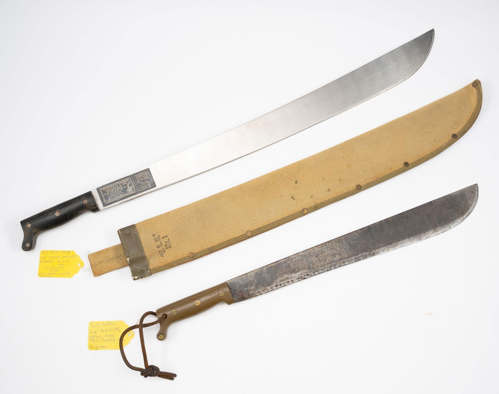2 U.S. Machetes: NOT ELIGIBLE FOR IN-HOUSE SHIPPING OUTSIDE THE UNITED STATES. Includes U.S. Army 24" machete dated 1945 true temper mfg, no scabbard; and U.S. Navy WWII 26" Collins machete marked U.S.N. MK1 Collins C