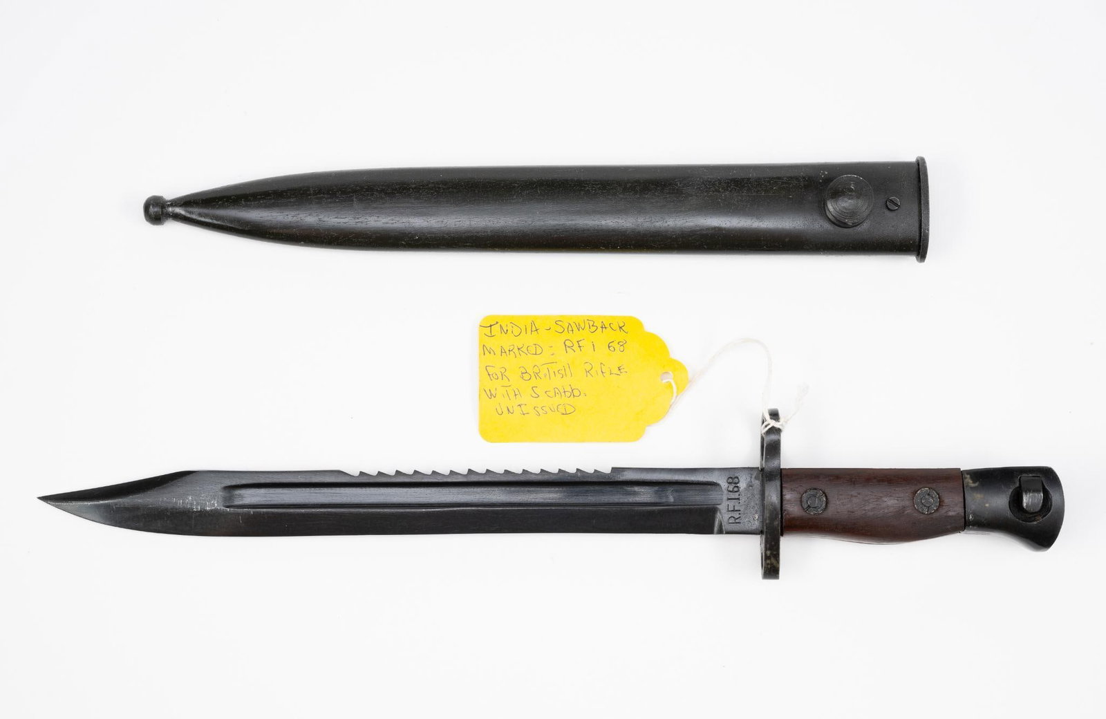 Indian Sawback Bayonet: NOT ELIGIBLE FOR IN-HOUSE SHIPPING OUTSIDE THE UNITED STATES. Marked RF168. With scabbard. 15" long.