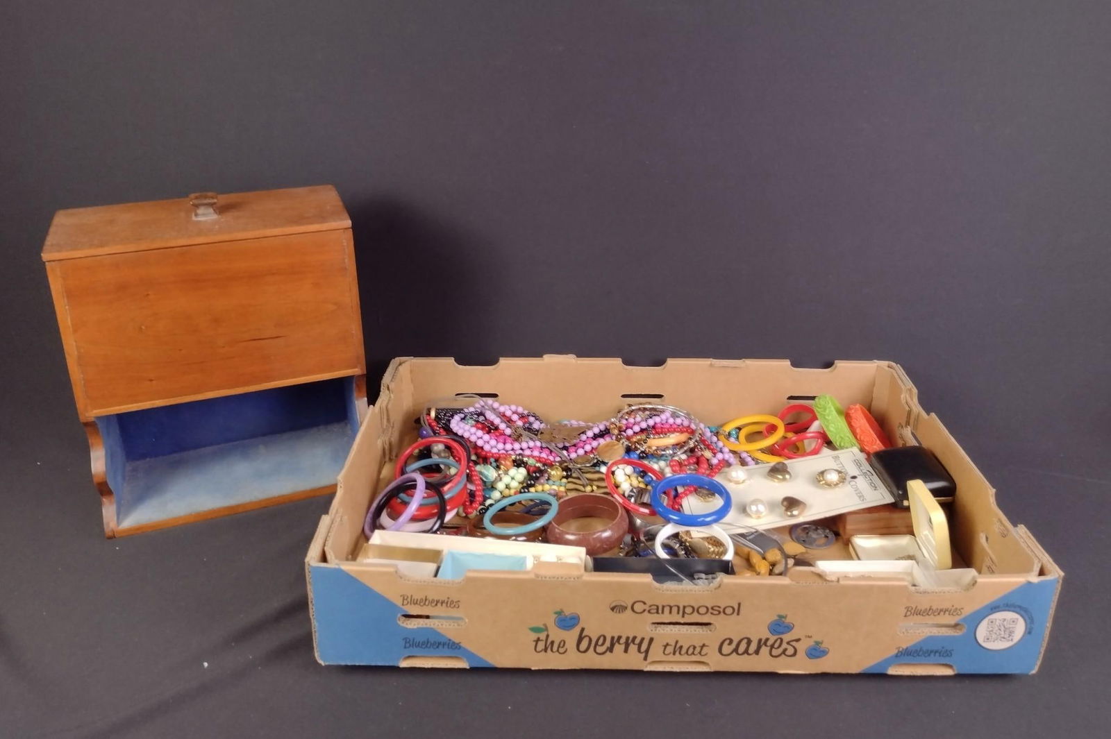 Lot of Costume Jewelry & Jewelry Box: Jewelry box measures 10-1/2" wide x 12-1/4" high. Includes necklaces, bangles, bracelets, and more. Includes 12k gold filled chain, 2 sterling silver rings, and stick pin with 14K gold top.