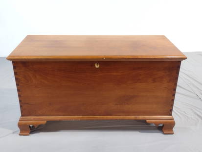 Stickley Blanket Chest: NOT ELIGIBLE FOR IN-HOUSE SHIPPING. 46" wide X 20" deep X 25" high. Sun bleaching to the back and lid towards the back section. Some scratches and white paint. Feet have adjustable knobs for height.