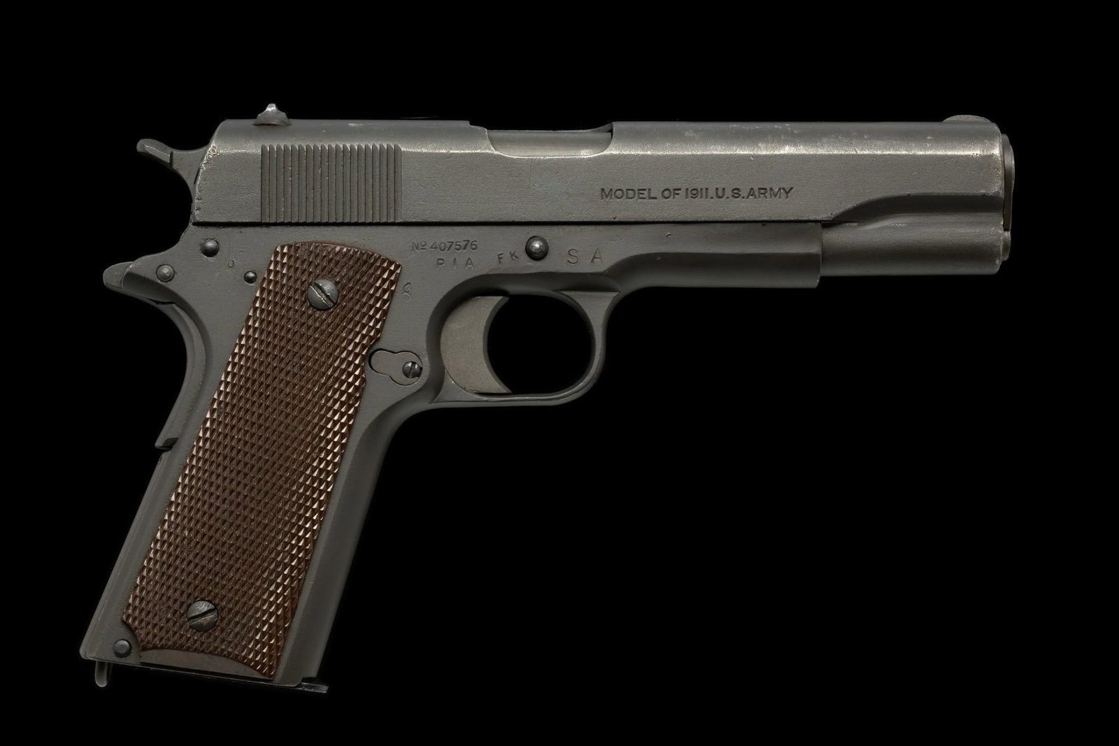 U.S. M1911 Semi Auto Pistol, Caliber .45ACP: Serial Number: 407576 Design: Here is a G.I. .45 pistol that, with the exception of plastic depot replacement grip panels and finish, remains in correct M1911 configuration; specifically, it has small