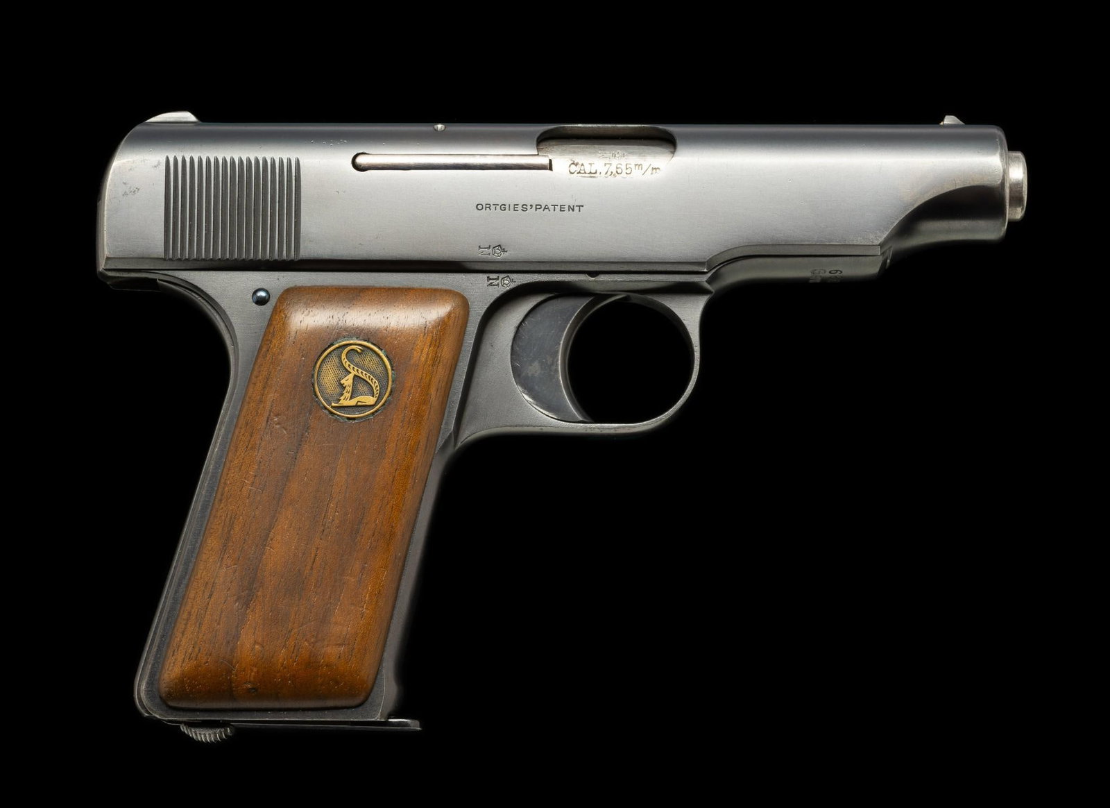 Ortgies' Patent Semi Auto Pistol, Caliber 7.65mm: Serial Number: 68614 Design: This Ortgies' Patent semi automatic pistol was built by Deutsche Werke/Werk Erfurt between 1921 and 1924. It is an early hammerless blowback platform. 8-round magazine cap