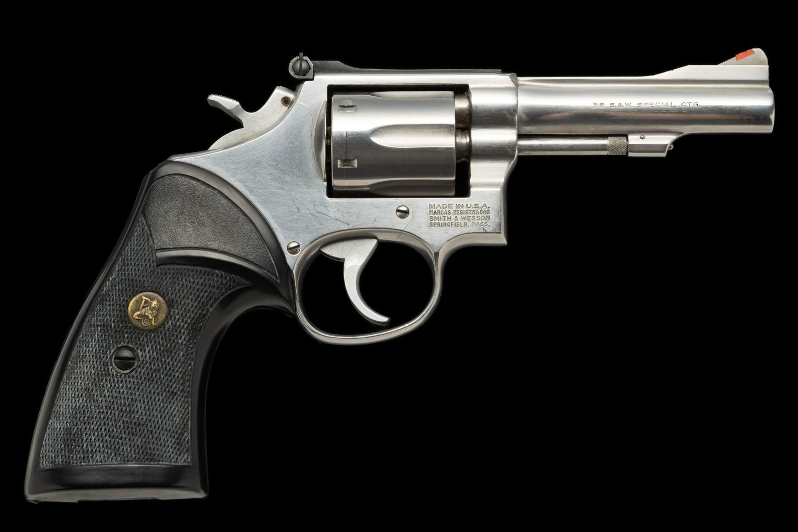 Smith & Wesson Model 67-1 Double Action Revolver, Caliber .38 Special: Serial Number: ADH2738 Design: The S&W Model 67-1 is a stainless steel double action revolver with a 4" barrel and 6-shot cylinder chambered for the .38 Special cartridge. Adjustable rear sight an