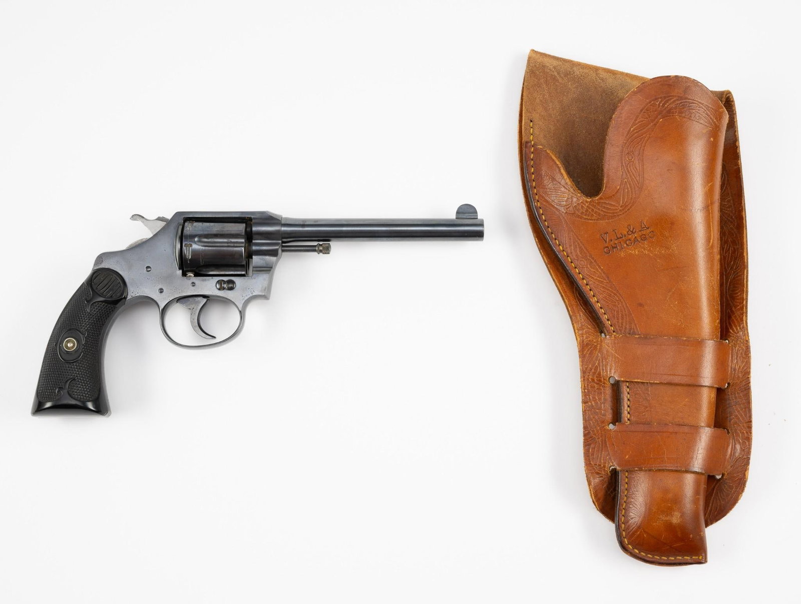 Colt Police Positive Double Action Revolver, Caliber .32 Police: Serial Number: 151862 Design: Here is a Colt Police Positive double action revolver that dates to 1919. it has a 5" barrel with a bright bore and a 6-shot cylinder. The grip panels are the early black