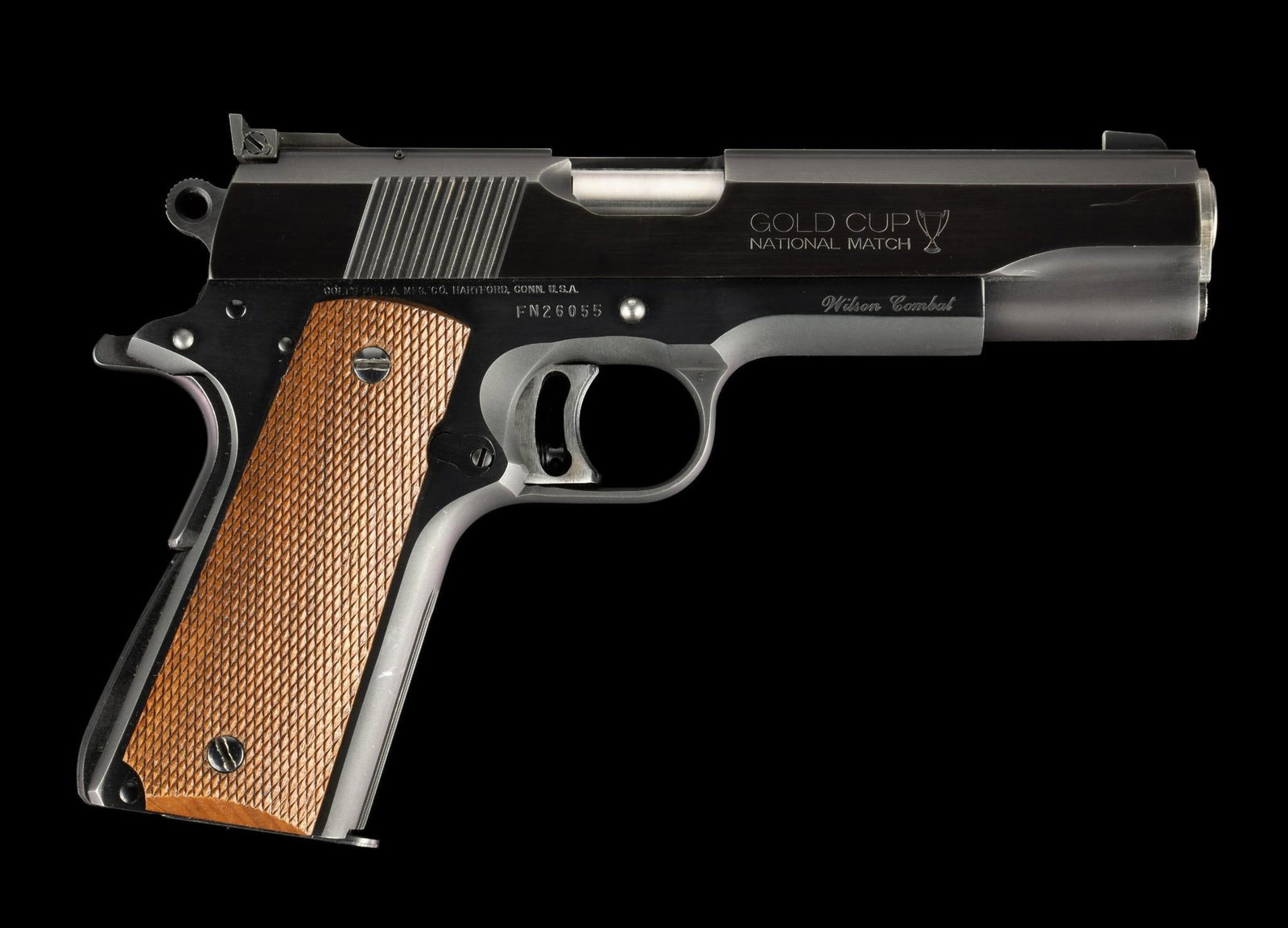 Colt Series 80 Gold Cup Semi Auto Pistol, Wilson Combat Upgraded, Caliber .45ACP: Serial Number: FN26055 Design: Here is a Colt Series 80, Mk. IV Gold Cup National Match semi automatic pistol manufactured in 1988 that has been upgraded and tuned by Wilson Custom Gun Shop of Berryvi