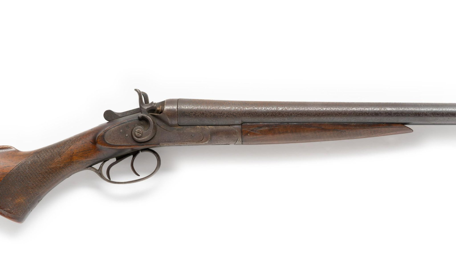 Antique "Occidental" Side-by-Side Double Shotgun, 12 Gauge: Serial Number: NSN Design: This 19th Century double barrel shotgun is marked on the left of the lock "Occidental" and on the right "The Interchangeable." It was made by Auguste Francotte & Cie and Neu