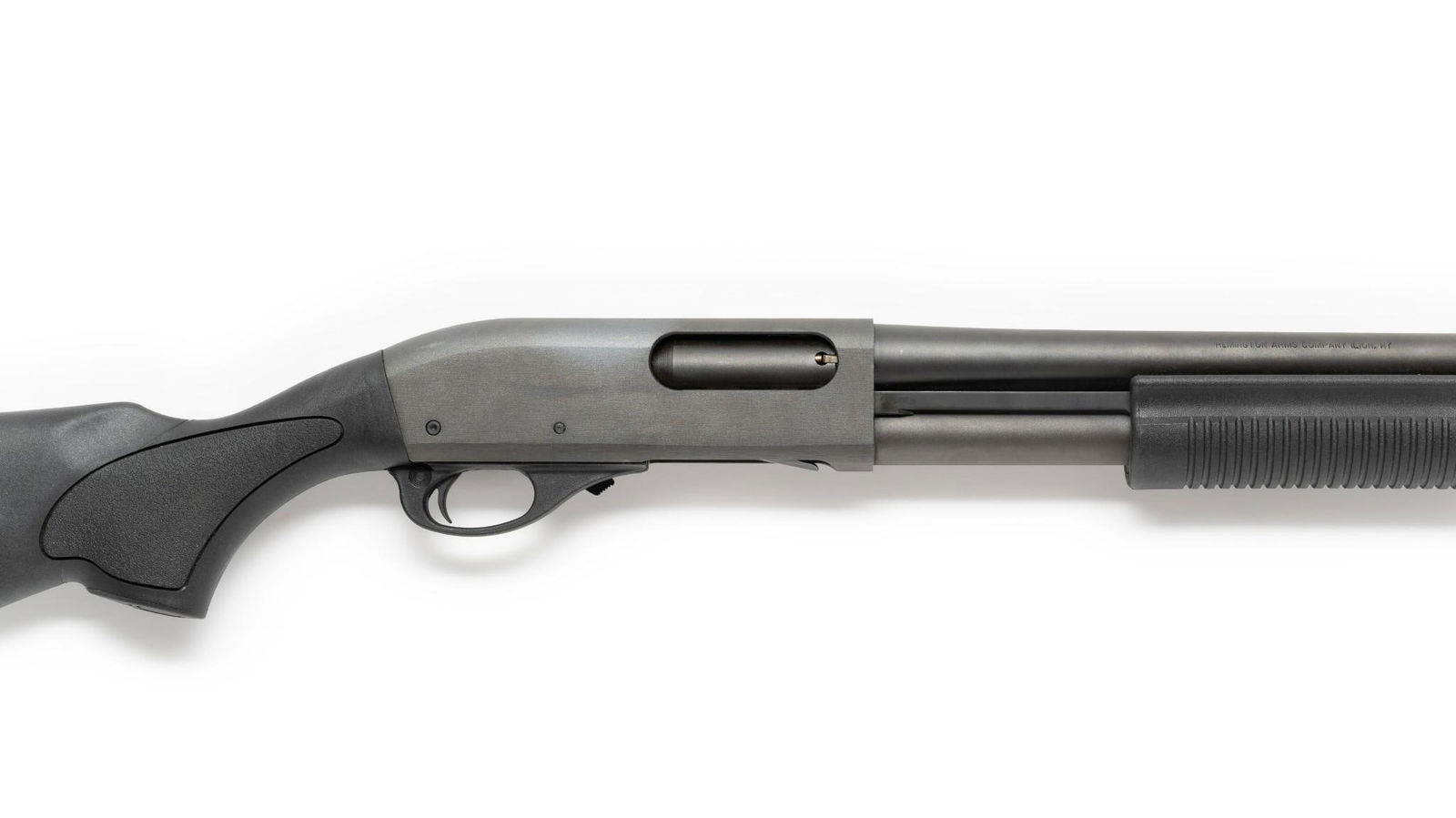 Remington Model 870 Tactical Shotgun, 12 Gauge: Serial Number: RS13245B Design:This Remington Model 870 tactical shotgun has a Parkerized finish and an 18 1/2" barrel. This gun is chambered for both 2 3/4" and 3" 12 gauge shells. Black polymer stoc