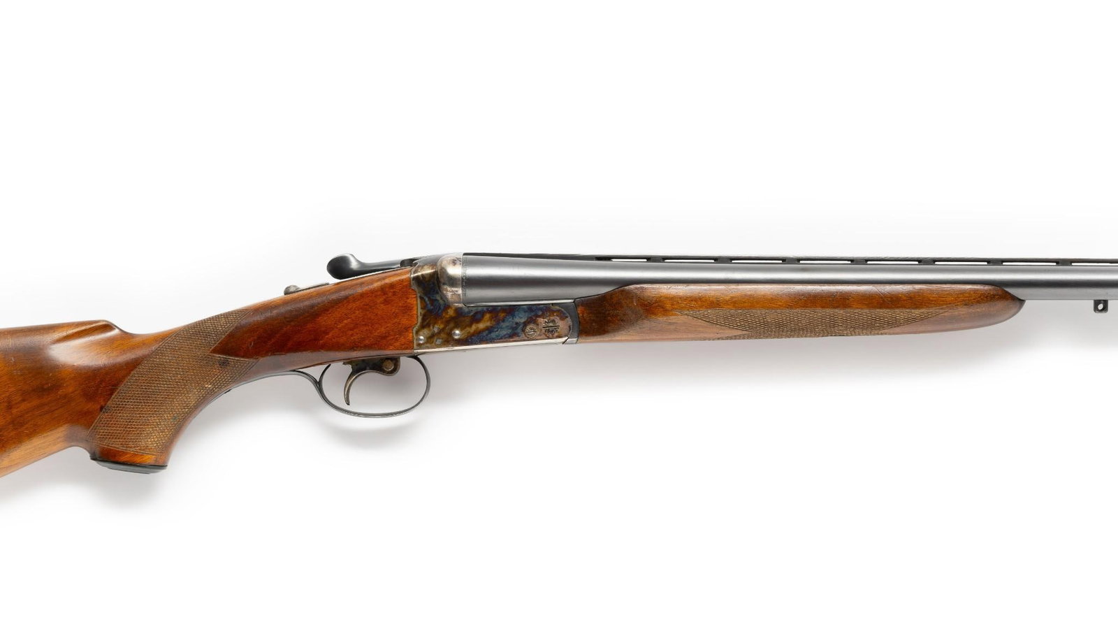 AYA (Spanish) Side-by-Side Double Shotgun, 20 Gauge: Serial Number: 306407 Design: This AYA double barrel shotgun is marked on the right barrel, "AYA Aguirre & Aranzabal--Made in Spain." 28" barrels with vent rib, full and modified chokes. This example 