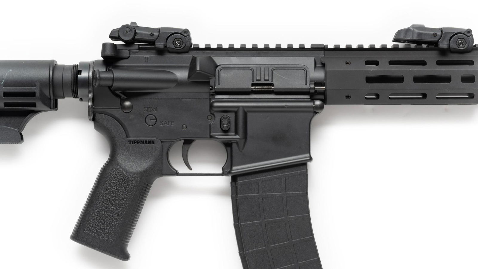 Tippmann Arms M4-22 Micro Semi Auto Pistol w/ Arm Brace, Caliber .22lr: Serial Number: 058580 Design: This Tippmann Arms Co. M4-22 Micro semi automatic pistol has a 7" barrel which is now fitted with a 2" compensator and is suppressor ready. Full-length Picatinny rail on