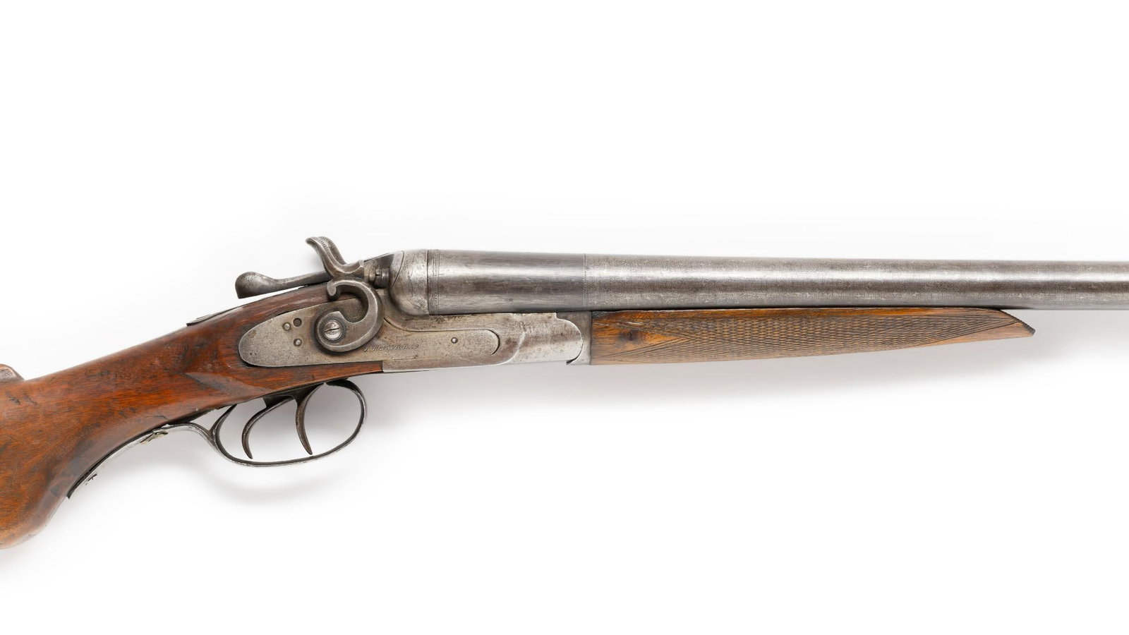 Belgian "Rickard" Damascus Steel Double Shotgun, 12 Gauge: Serial Number: 15160 Design: This Belgian side-by-side double barrel shotgun has Damascus steel barrels, 30" long, both choked modified. Marked on barrel rib "Belgium Fine Damascus Finish." Exposed ha