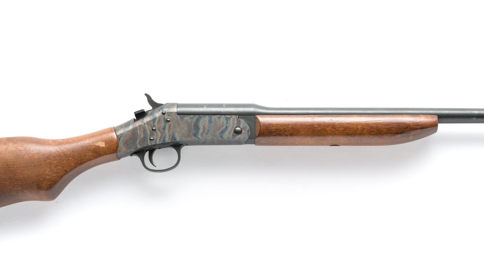 New England Firearms "Pardner" Model SB1 Single Shot Shotgun, .410 Bore: Serial Number; NA130432 Design: The "Pardner" Model SB1 shotgun is a .410 bore single shot piece made by the New England Firearms Co., Inc. of Gardner, MA. This example has a 25 1/2" barrel with a bri