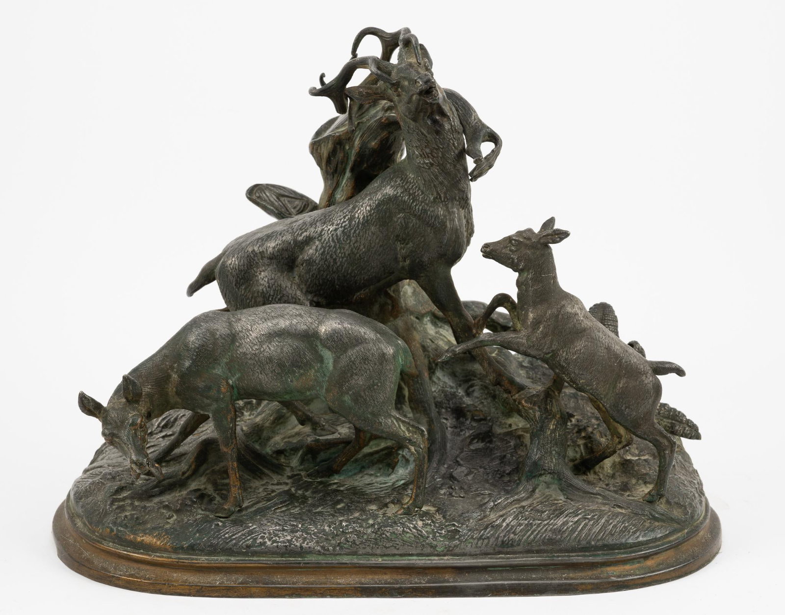 In The Manor of Pierre Jules Deer Sculpture: Cast mental. Overall: 12" wide x 6-1/2" deep x 9-1/2" high. Finish losses and oxidation throughout.