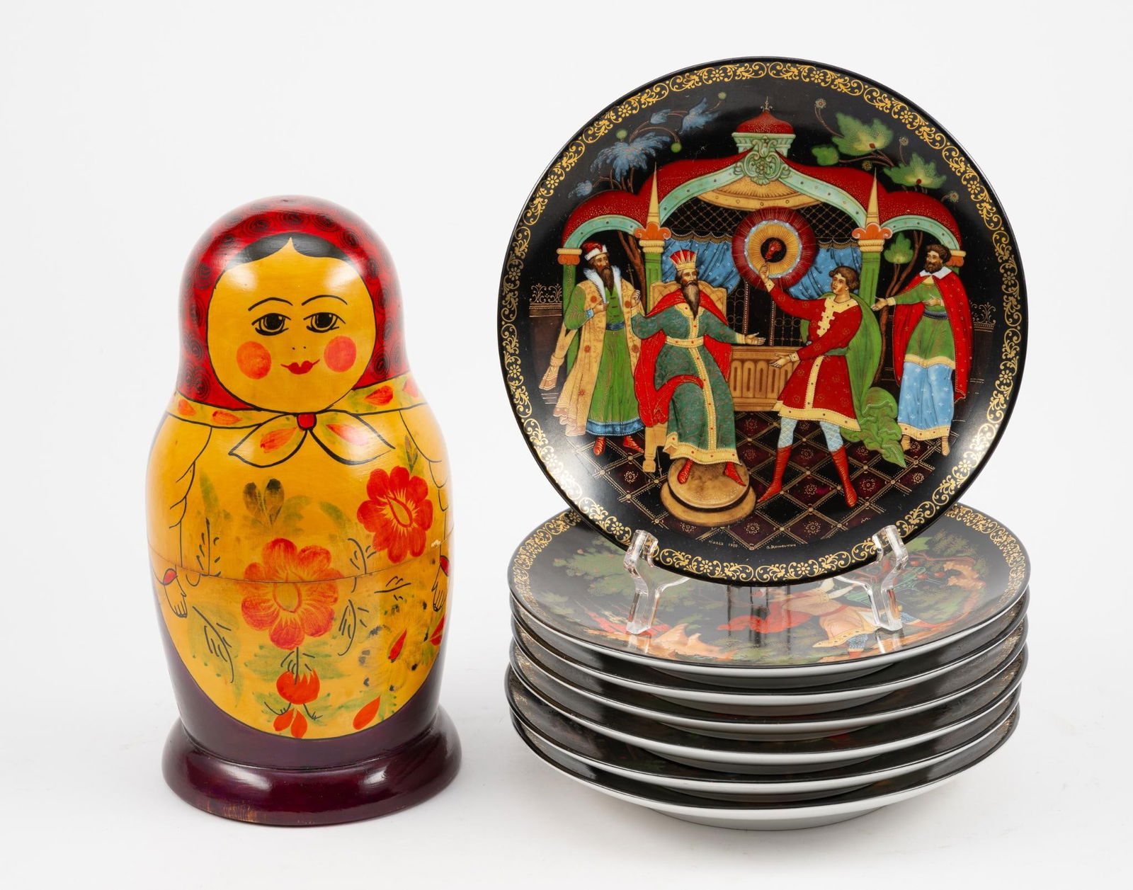 USSR Nesting Doll and 4 Tianex Russian Plates: Plates: 7-3/4" diameter. Series of 10 graduating nesting dolls. 5/8" to 9-1/2" high. Some with cracks to wood.