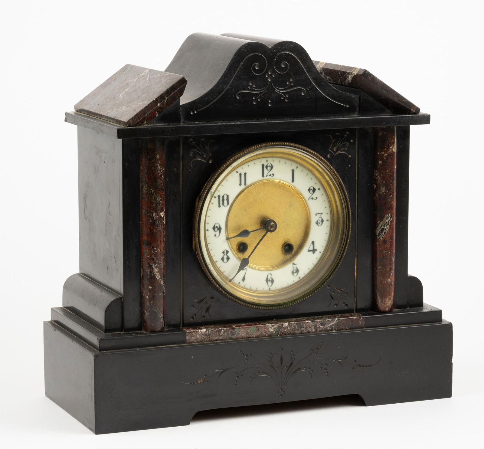 Slate and Marble Mantel Clock: Starts and stops. Overall: 12-1/4" wide x 5-1/2" deep x 11-3/4" high. Minor losses around edges.