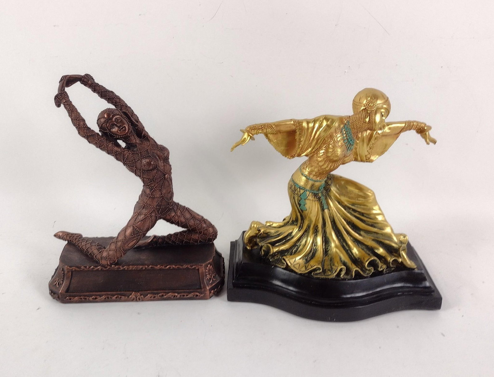 2 Dancer Figurines: 9" to 10" wide x 4" to 7" deep x 10" to 10-1/4" high.
