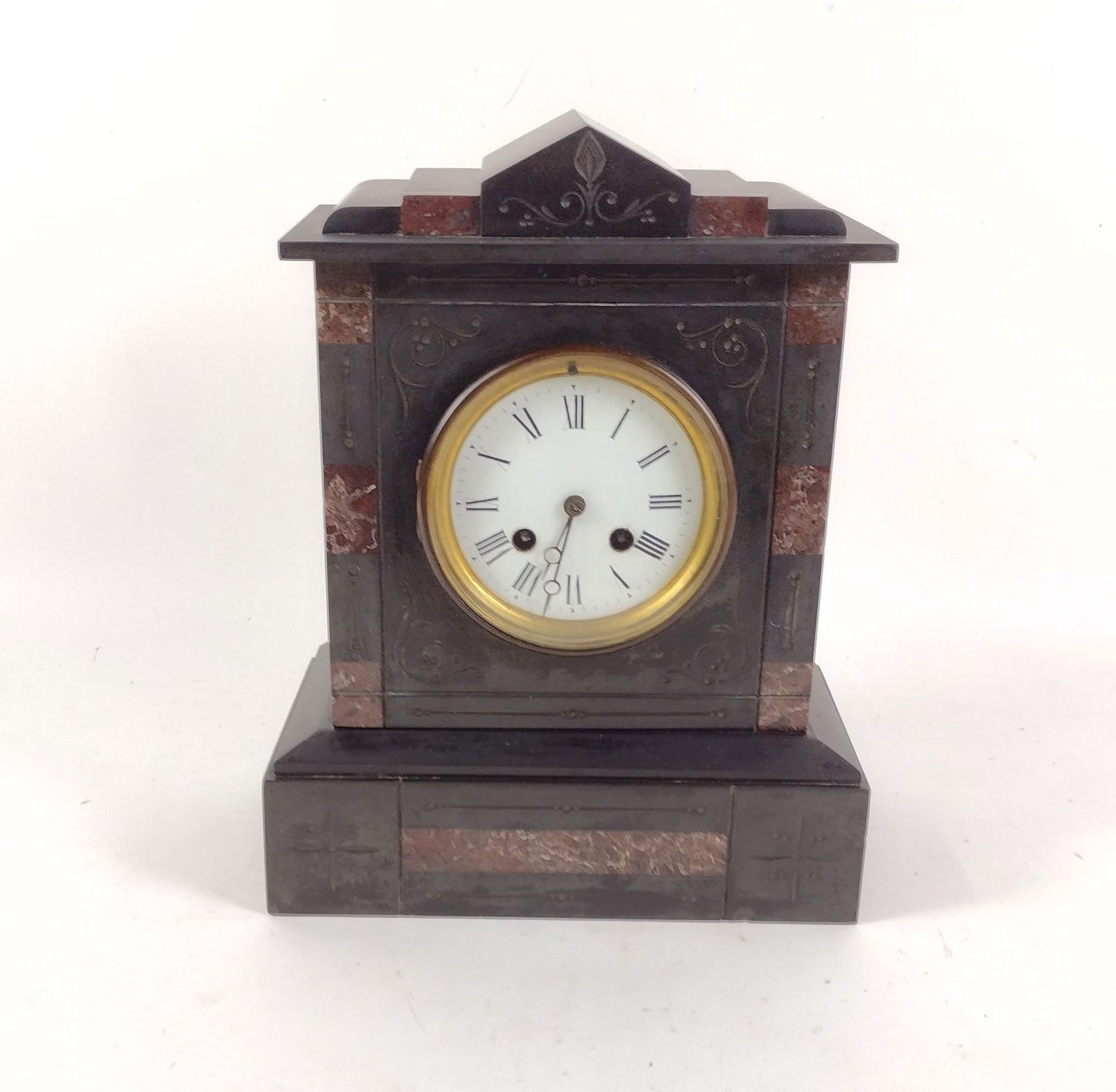 Slate and Marble Mantel Clock: Overwound. Not running. 9-3/4" wide x 5-3/4" deep x 12-1/4" high. Some chips and losses to slate.