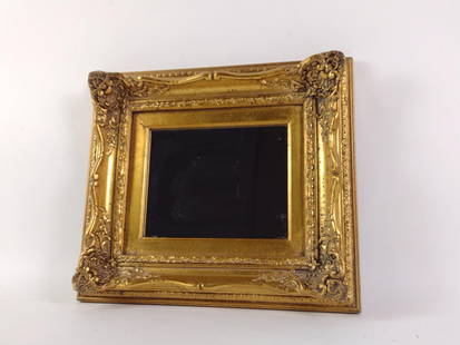 Gilt Wall Mirror: NOT ELIGIBLE FOR IN-HOUSE SHIPPING. Overall with frame: 15-1/4" high x 17-1/4" wide. Minor wear / losses to paint and crack to right side of wood frame.