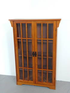 Glass Door Bookcase: NOT ELIGIBLE FOR IN-HOUSE SHIPPING. 34" wide X 14" deep X 50" high.