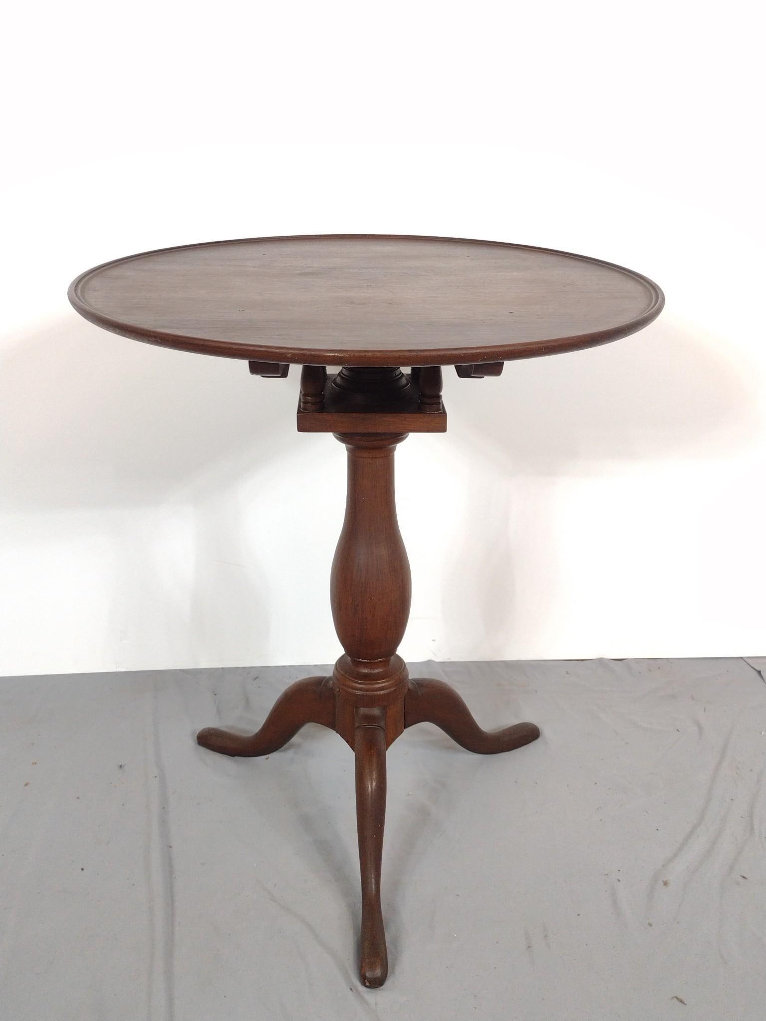 Tilt Top Table: NOT ELIGIBLE FOR IN-HOUSE SHIPPING. 23" diameter X 26-1/2" high. Has a few light scratches.