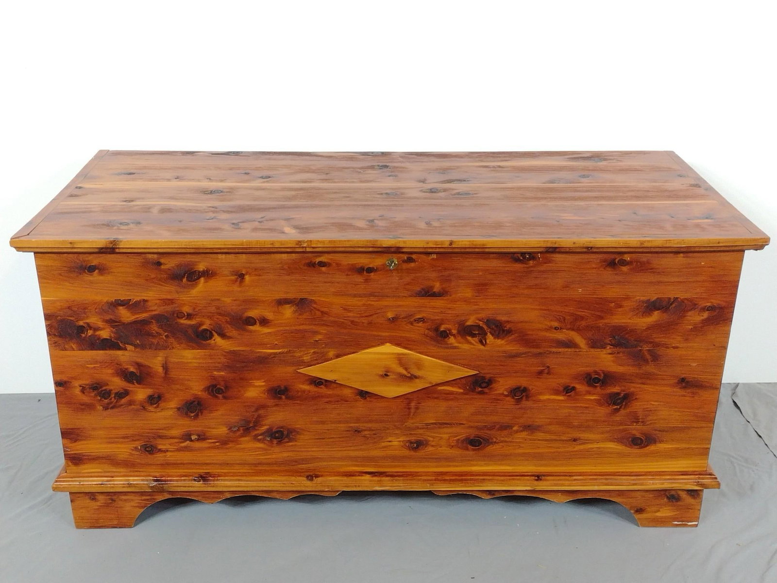 Cedar Chest: NOT ELIGIBLE FOR IN-HOUSE SHIPPING. 48" wide X 21" deep X 23" high. Has a few light scratches.